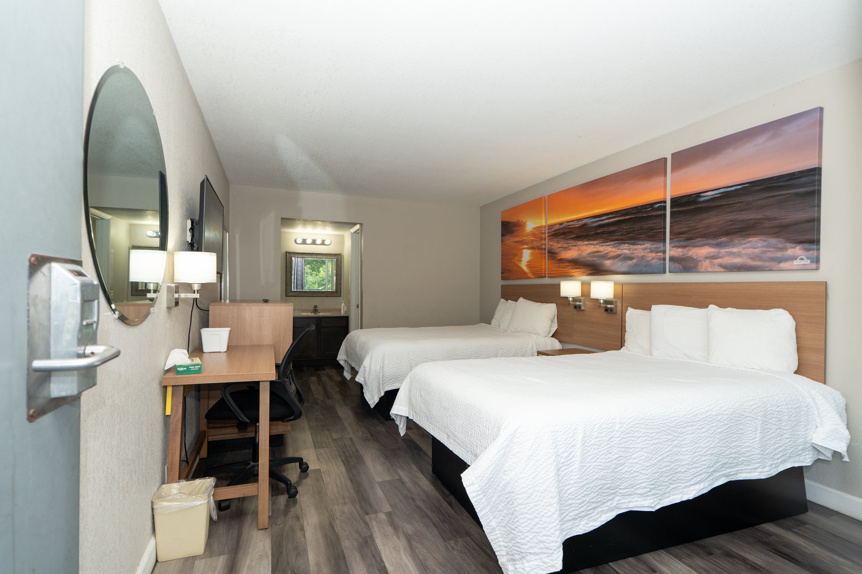 Guest room at the Days Inn & Suites by Wyndham Dayton North in Dayton, Ohio
