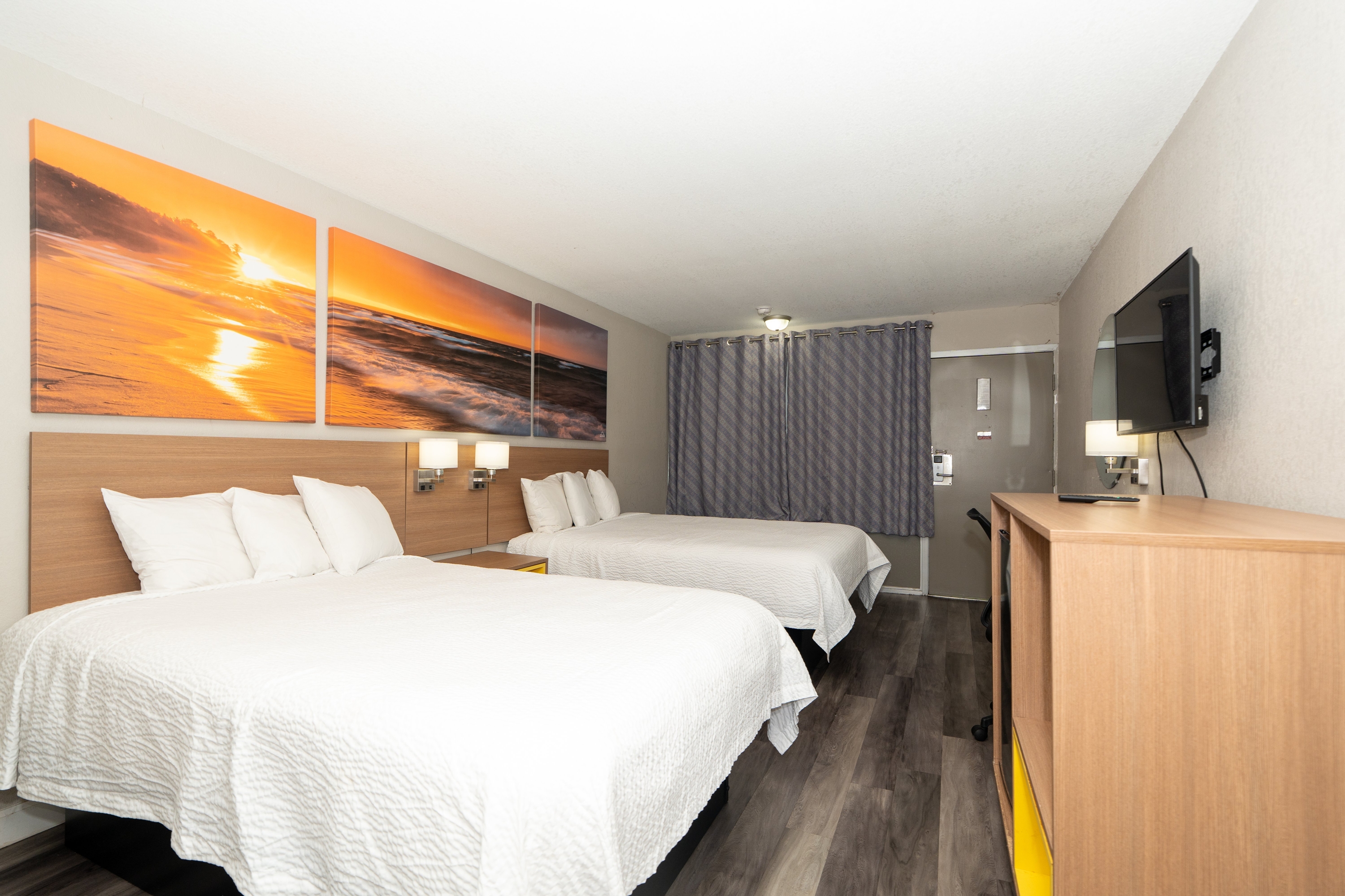Guest room at the Days Inn & Suites by Wyndham Dayton North in Dayton, Ohio