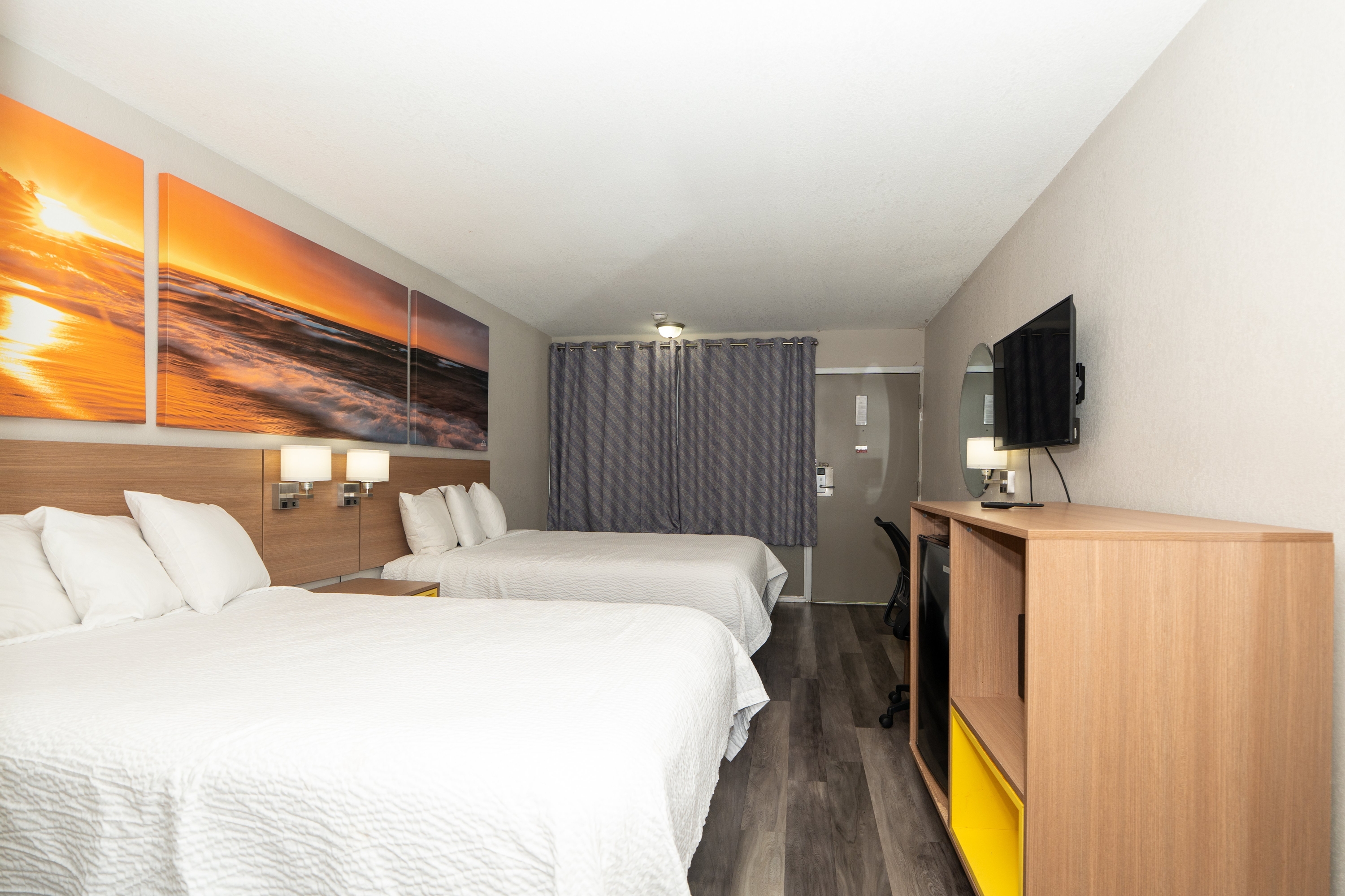 Guest room at the Days Inn & Suites by Wyndham Dayton North in Dayton, Ohio