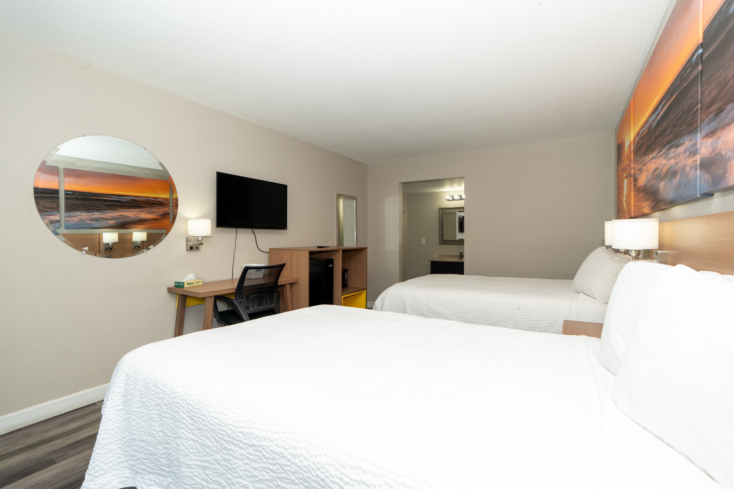 Guest room at the Days Inn & Suites by Wyndham Dayton North in Dayton, Ohio