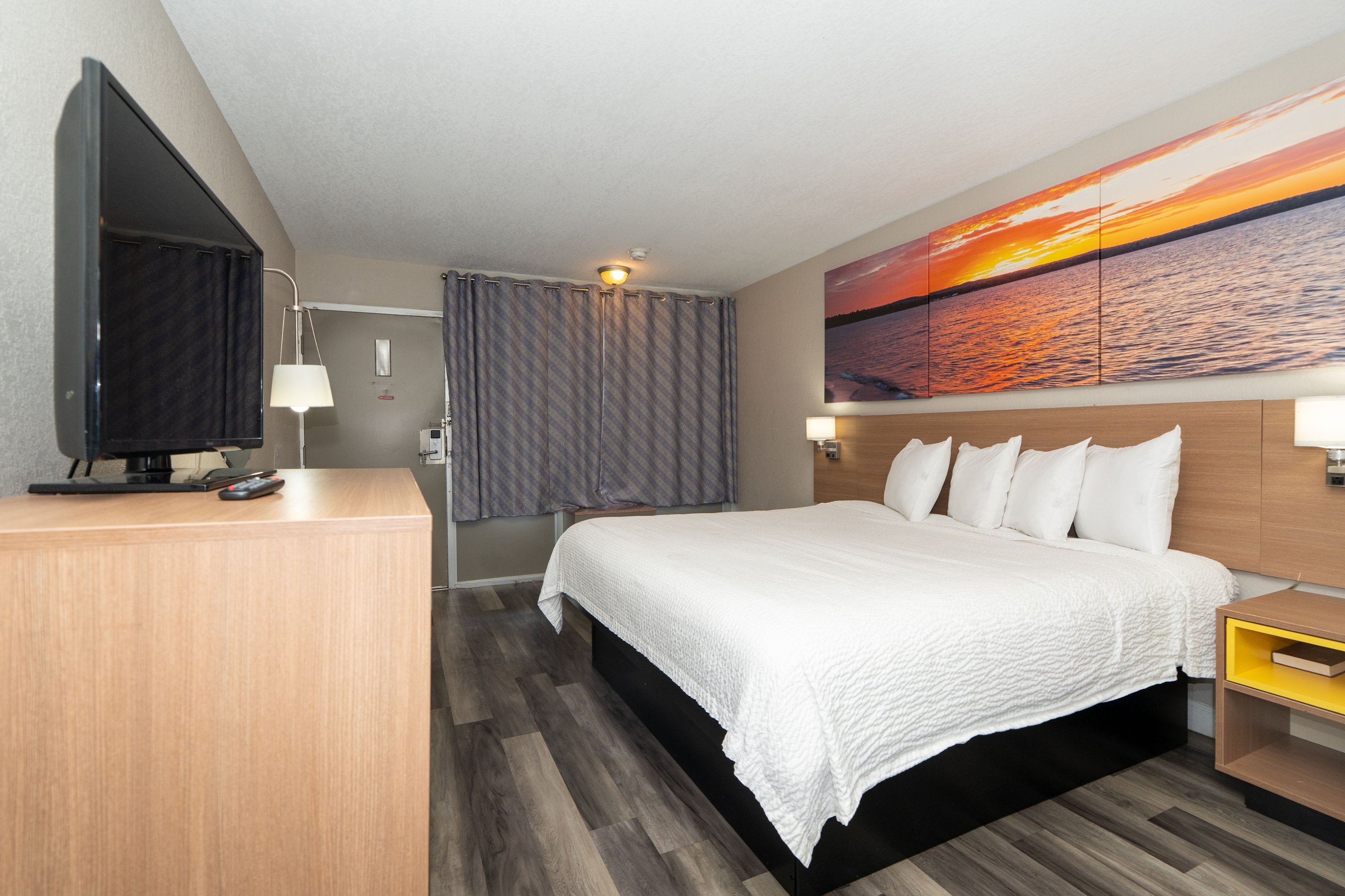 Guest room at the Days Inn & Suites by Wyndham Dayton North in Dayton, Ohio