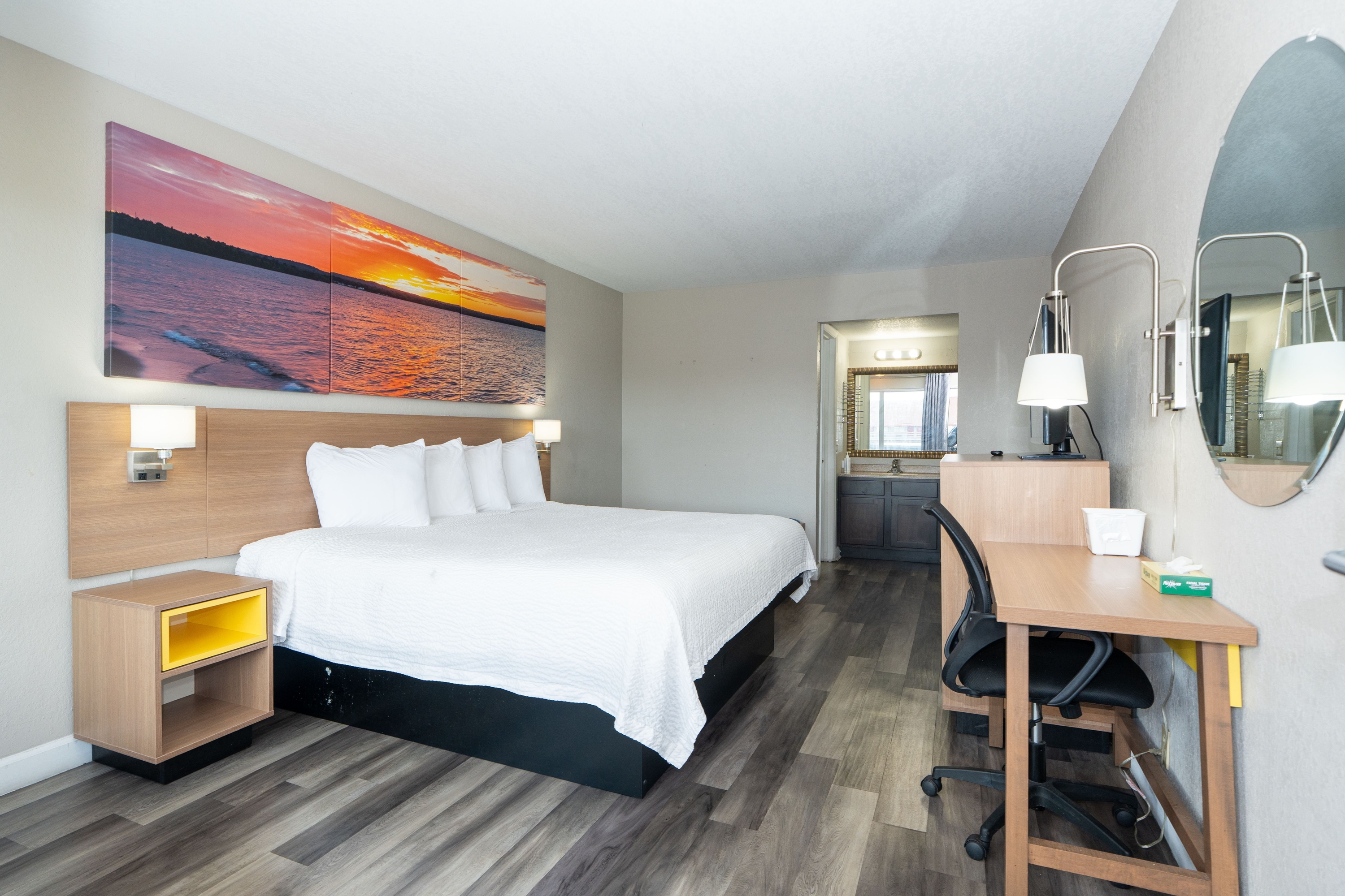 Guest room at the Days Inn & Suites by Wyndham Dayton North in Dayton, Ohio