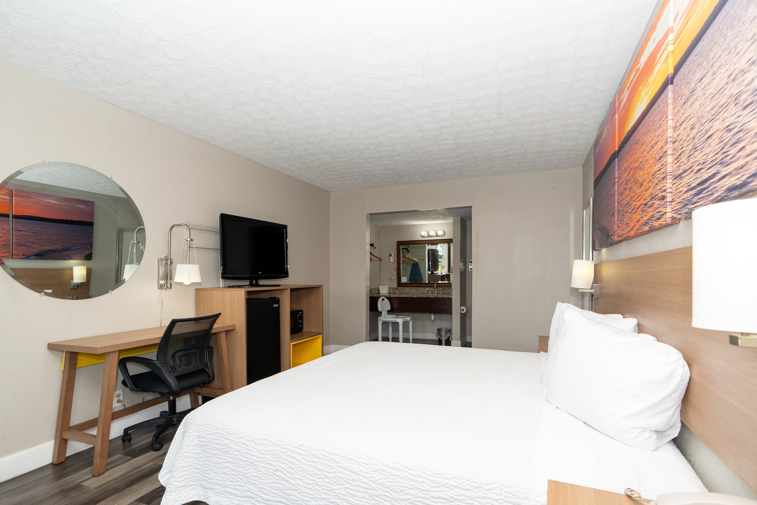 Guest room at the Days Inn & Suites by Wyndham Dayton North in Dayton, Ohio