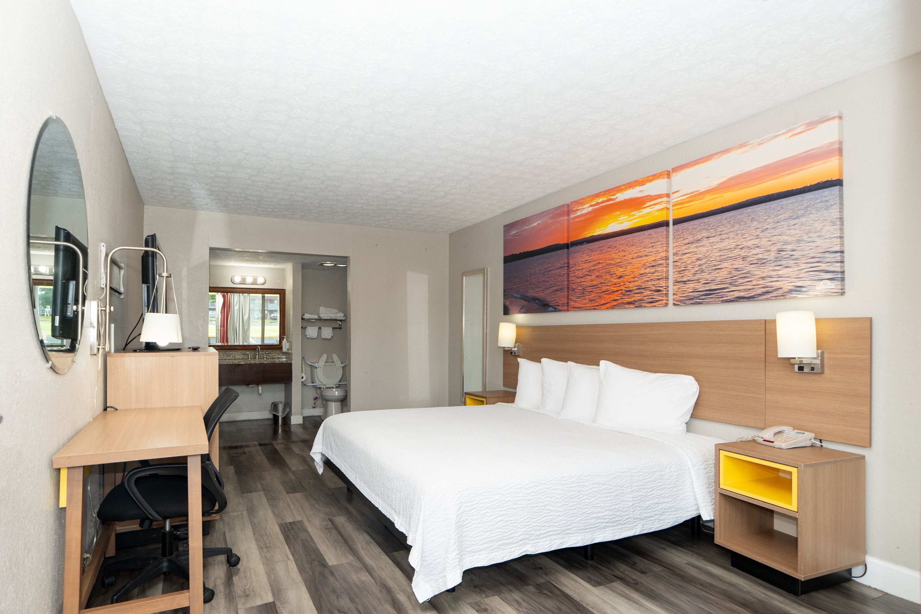 Guest room at the Days Inn & Suites by Wyndham Dayton North in Dayton, Ohio