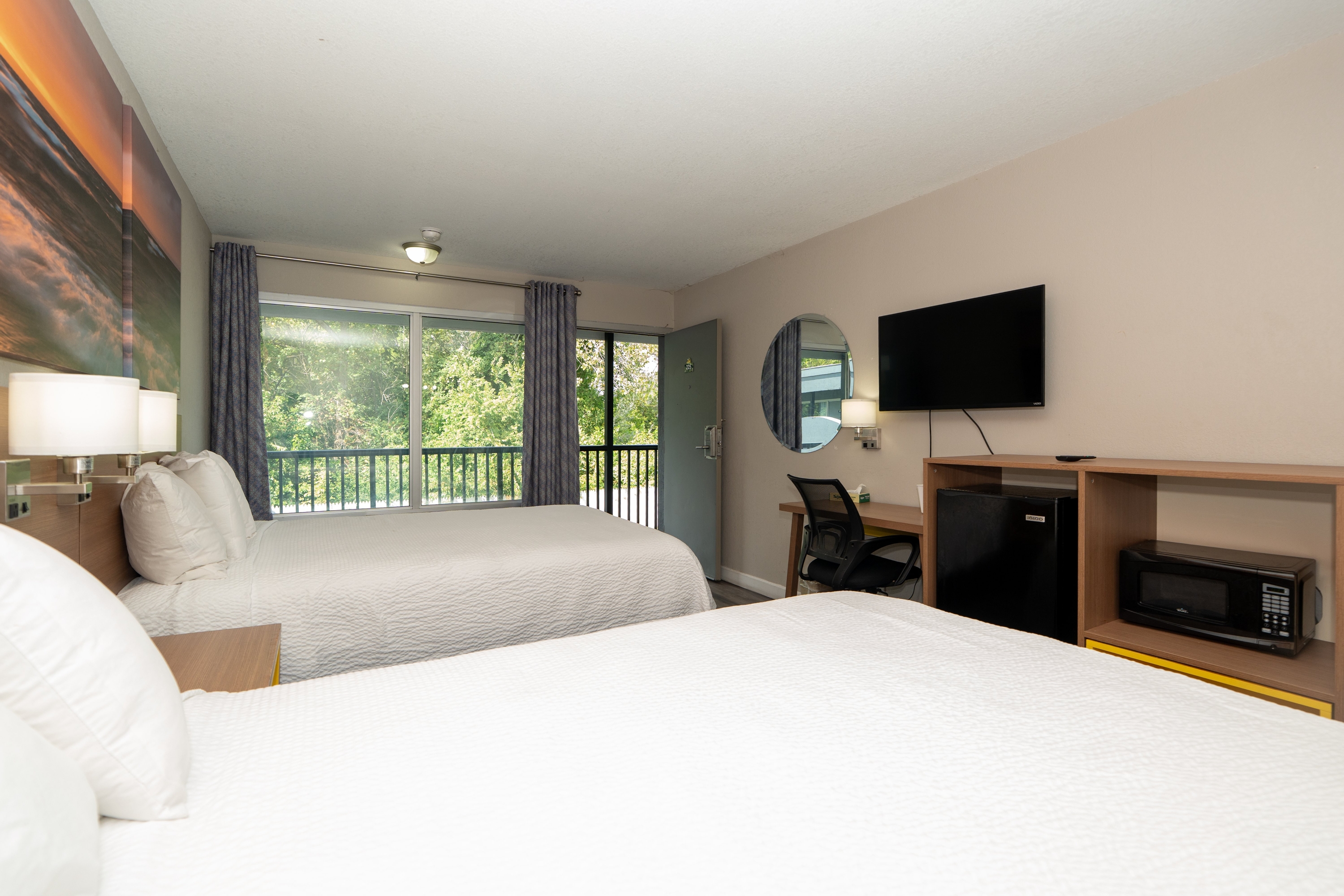 Guest room at the Days Inn & Suites by Wyndham Dayton North in Dayton, Ohio