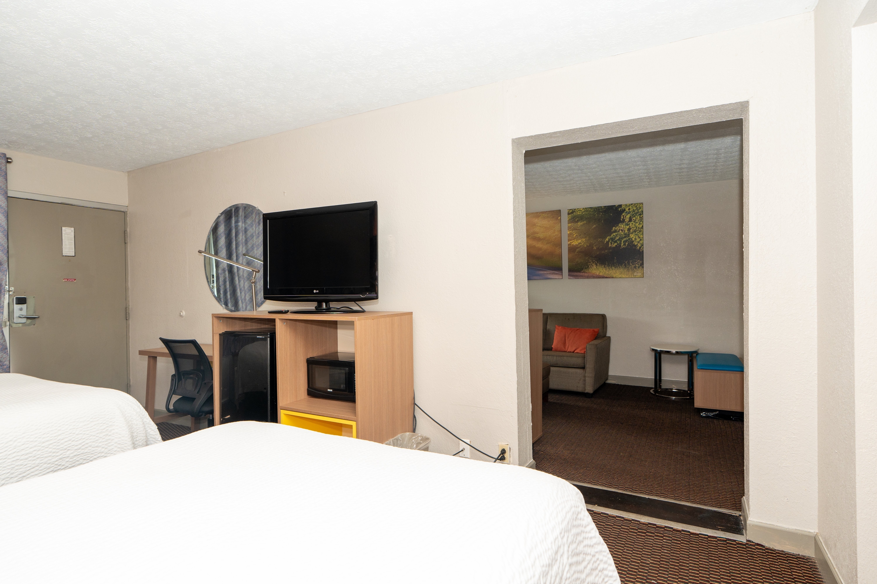 Guest room at the Days Inn & Suites by Wyndham Dayton North in Dayton, Ohio