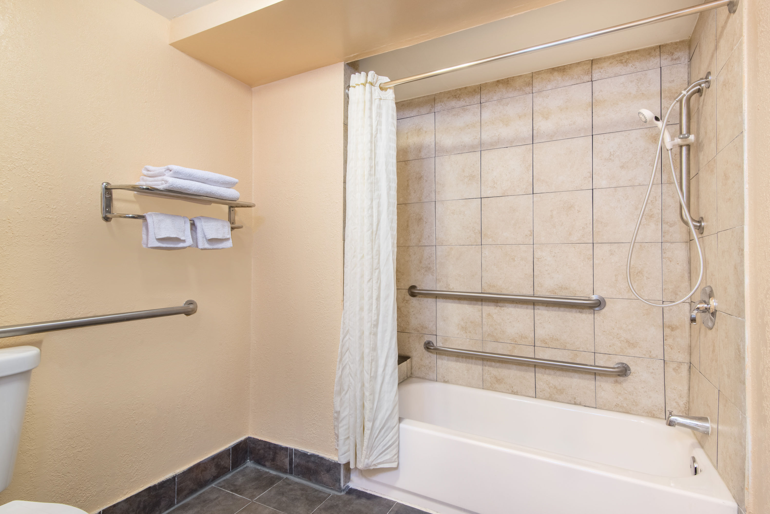Guest room at the Days Inn by Wyndham Grove City Columbus South in Grove City, Ohio