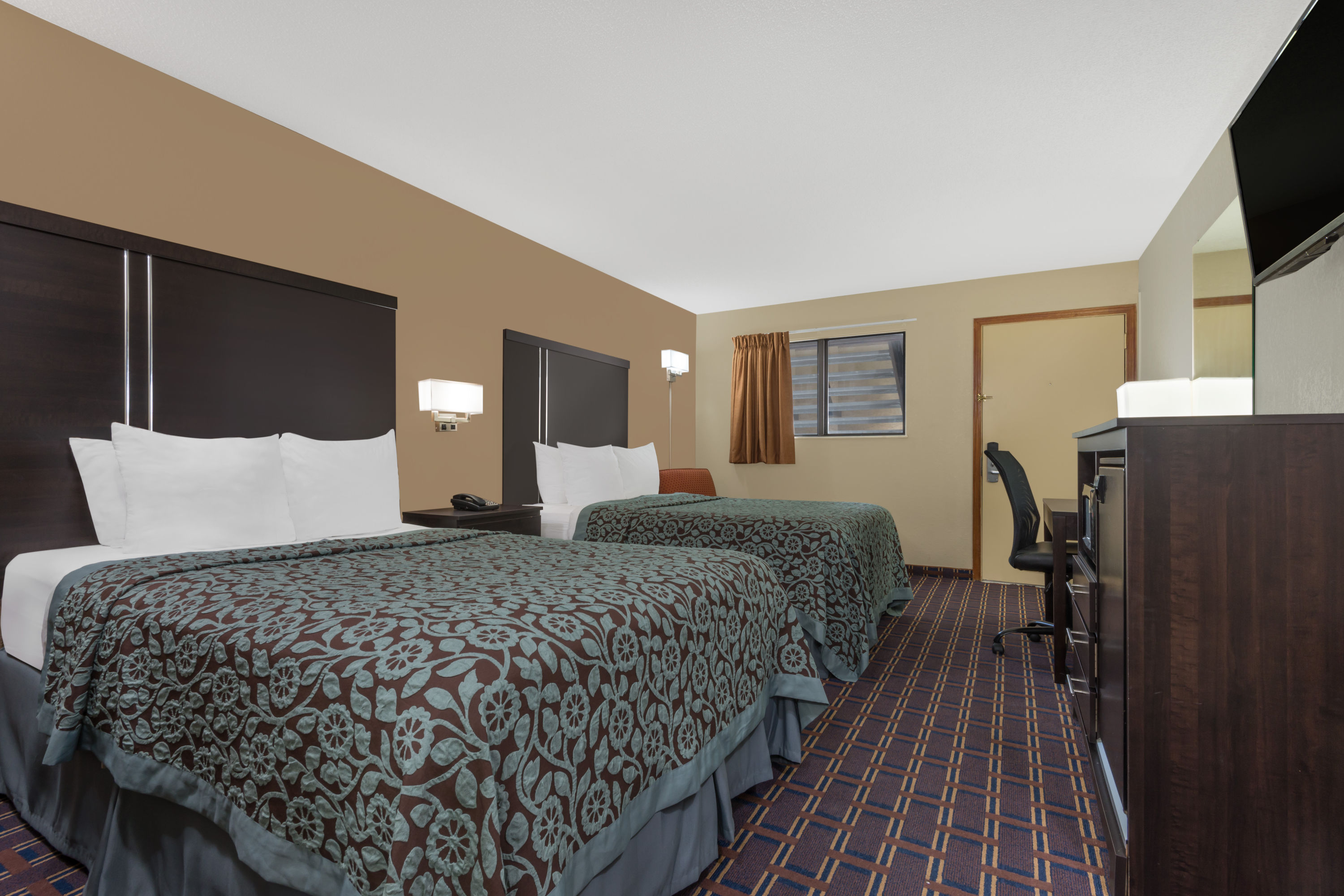 Guest room at the Days Inn by Wyndham Maumee/Toledo in Maumee, Ohio