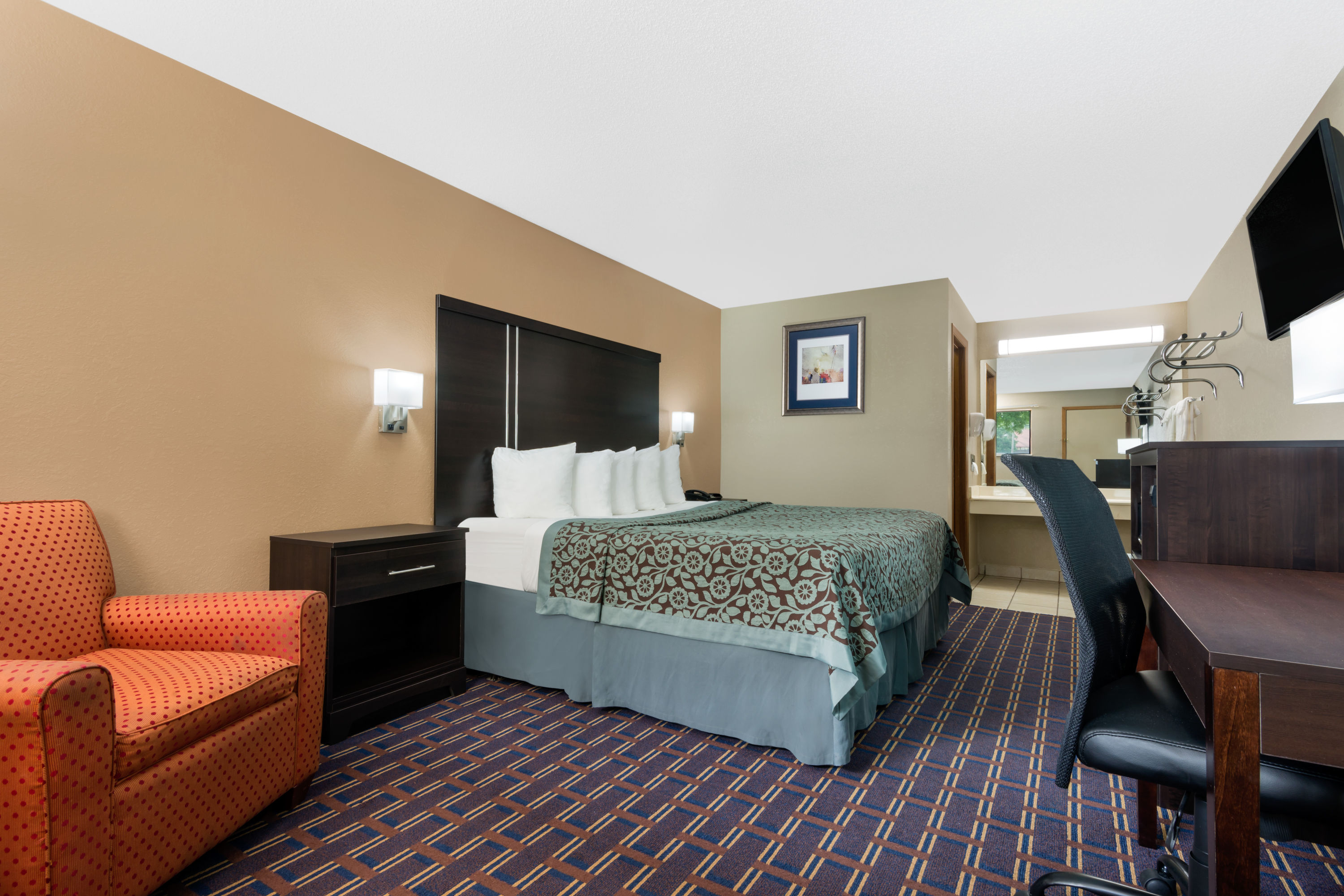 Guest room at the Days Inn by Wyndham Maumee/Toledo in Maumee, Ohio