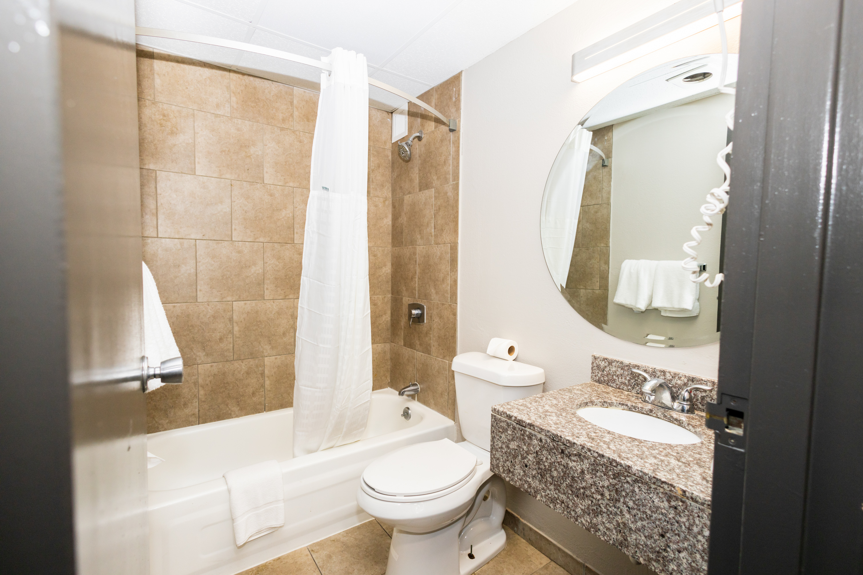 Guest room bath at the Days Inn by Wyndham Sharonville in Sharonville, Ohio