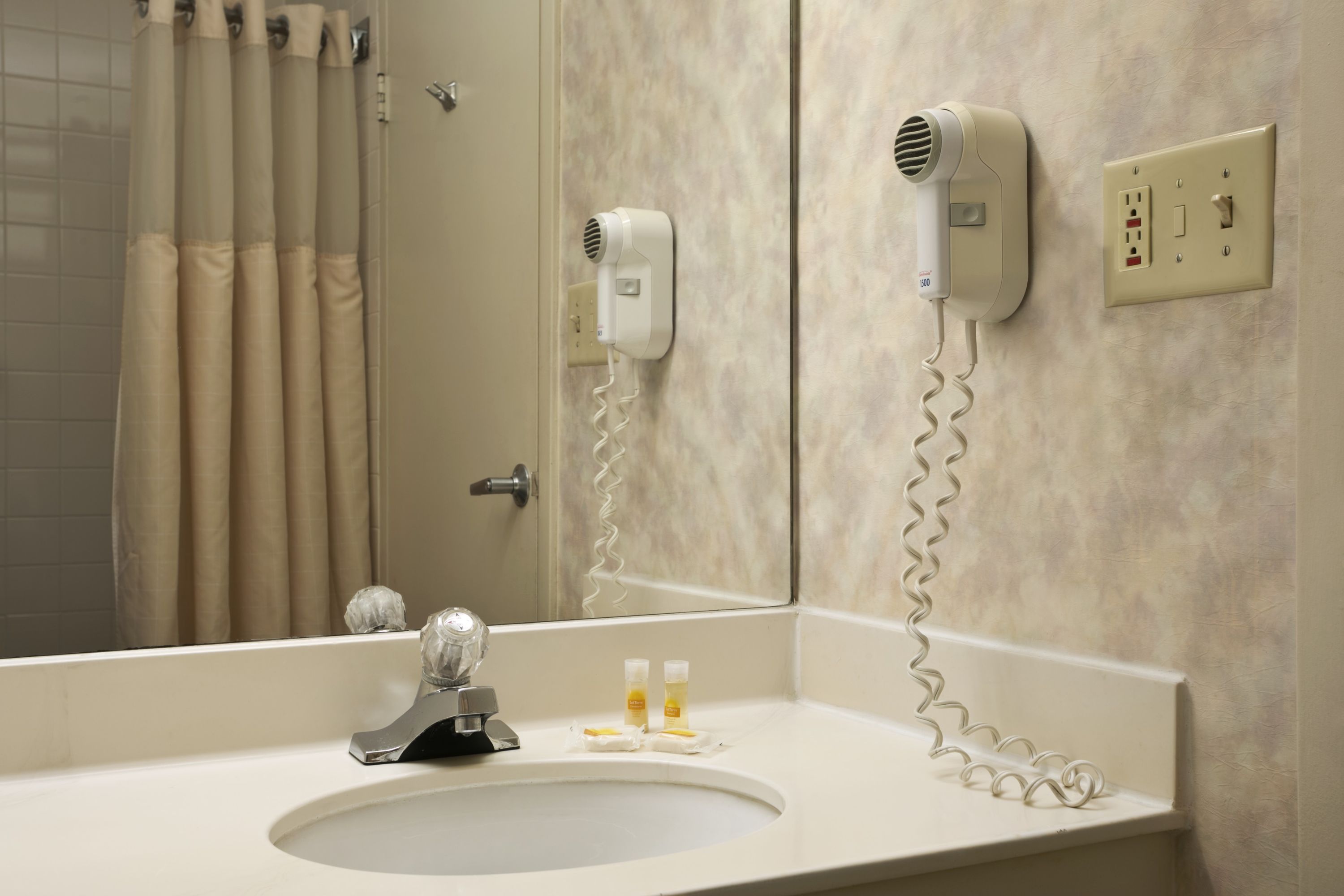 Guest room at the Days Inn by Wyndham Sidney OH in Sidney, Ohio