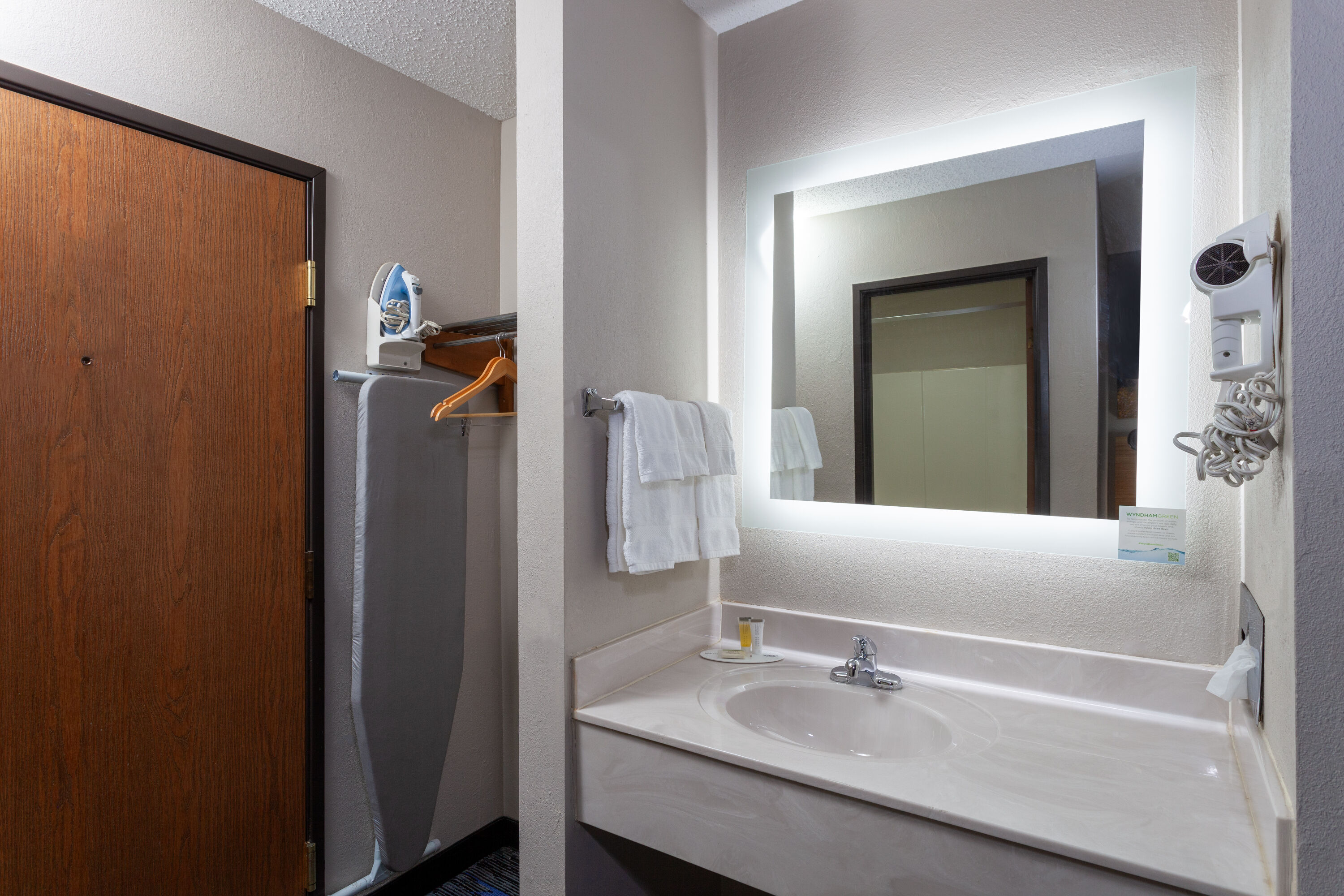 Guest room bath at the Days Inn by Wyndham Wooster in Wooster, Ohio