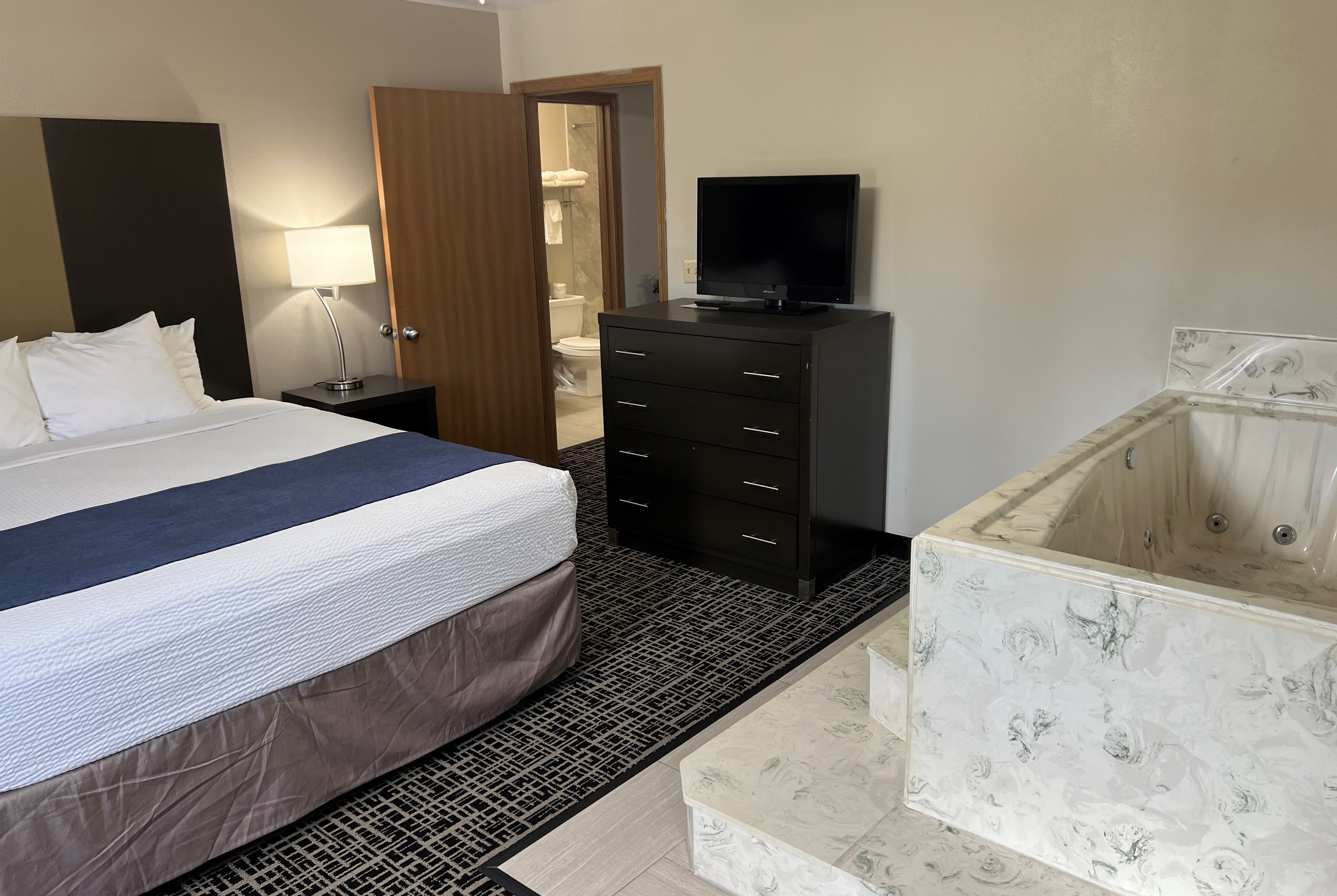 Guest room at the Days Inn by Wyndham Grove in Grove, Oklahoma