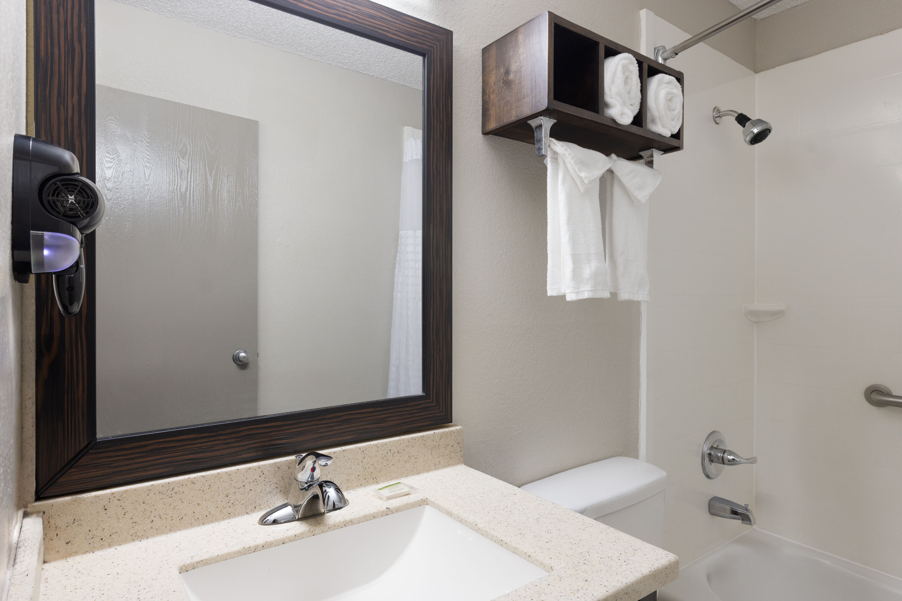 Guest room bath at the Days Inn by Wyndham Miami in Miami, Oklahoma