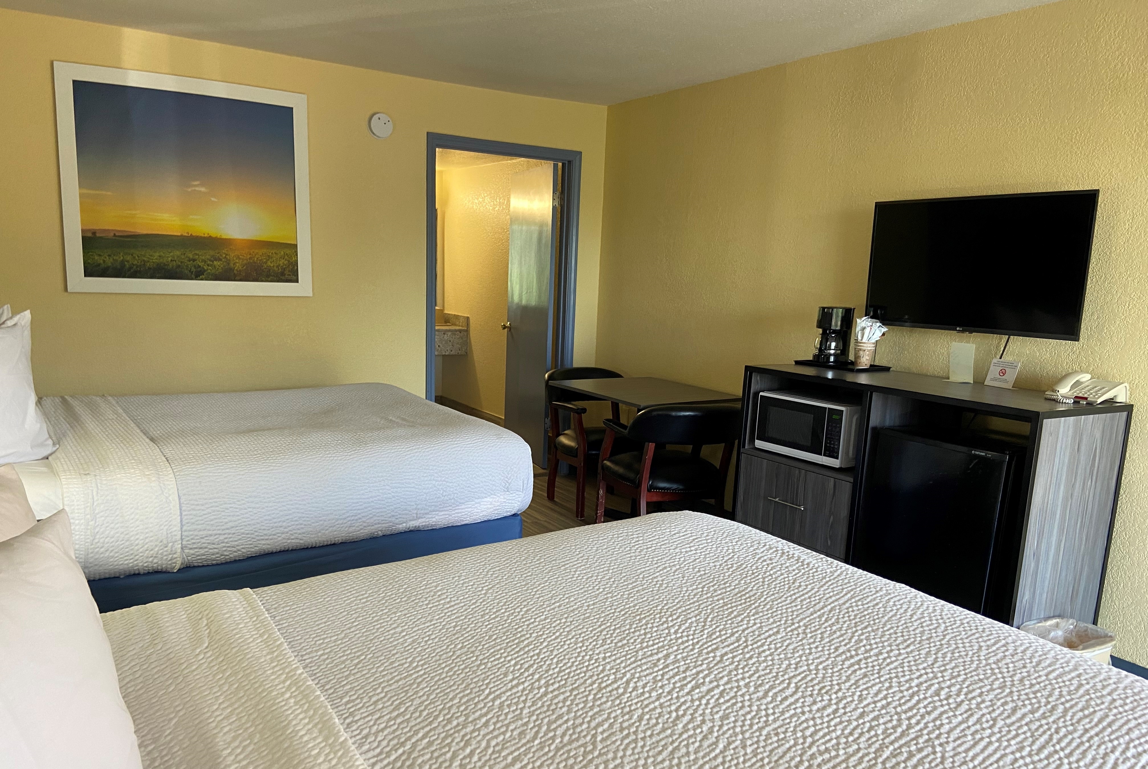 Guest room at the Days Inn by Wyndham Okmulgee in Okmulgee, Oklahoma