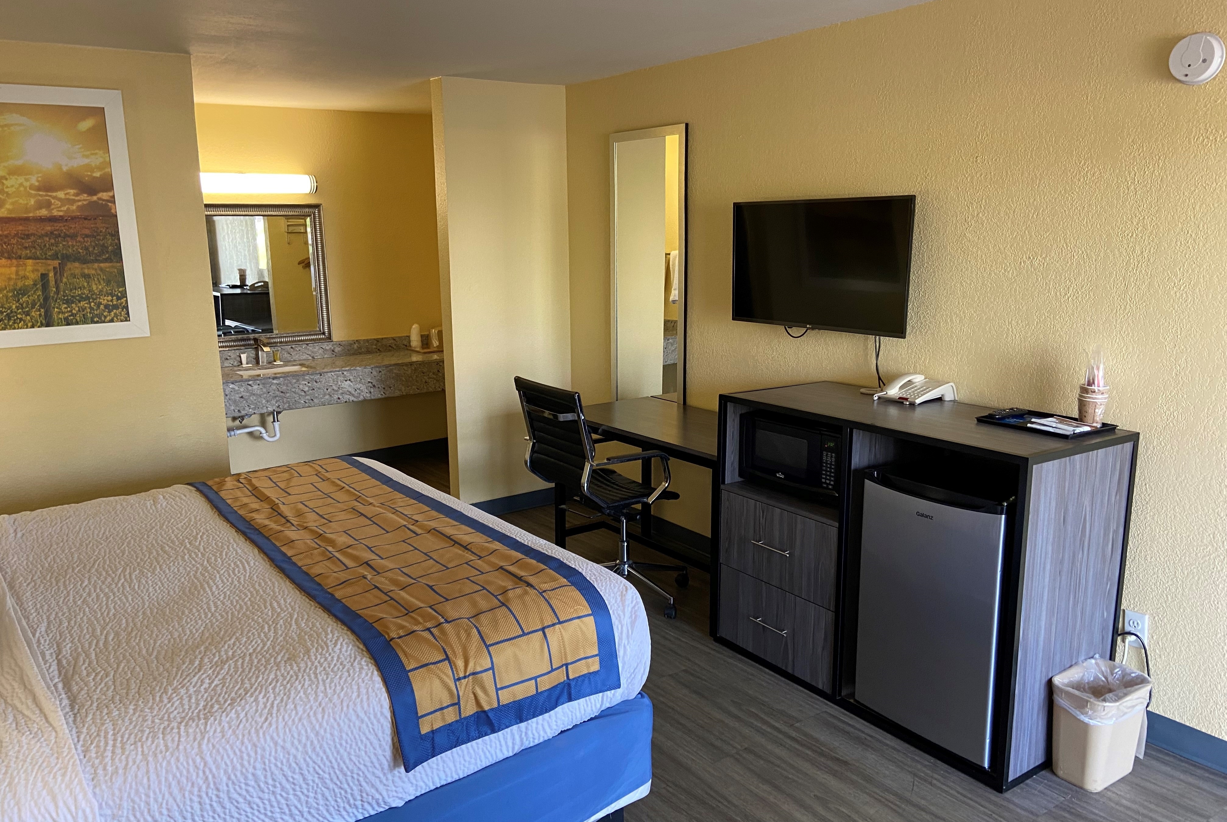 Guest room at the Days Inn by Wyndham Okmulgee in Okmulgee, Oklahoma