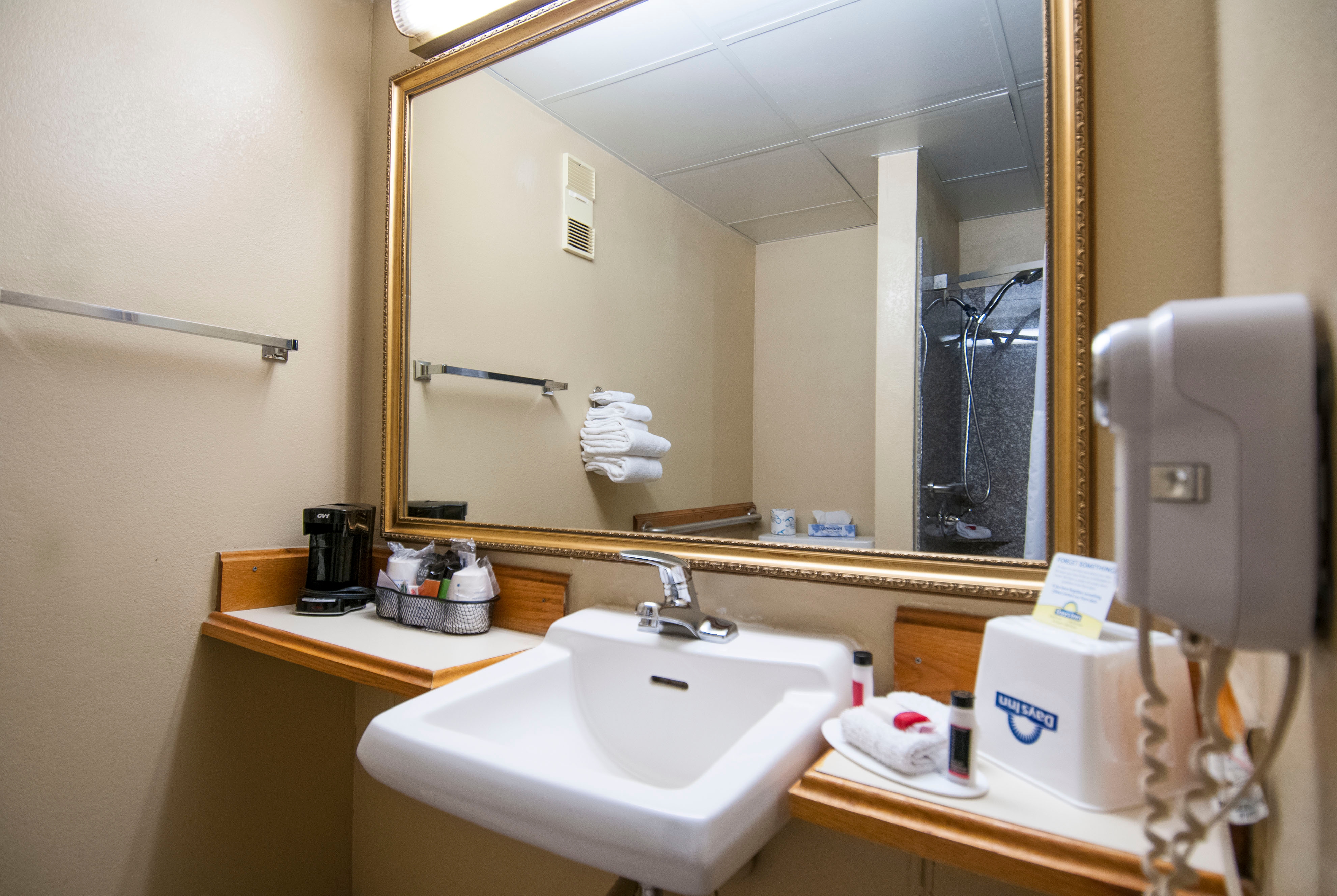Guest room bath at the Days Inn by Wyndham Pauls Valley in Pauls Valley, Oklahoma