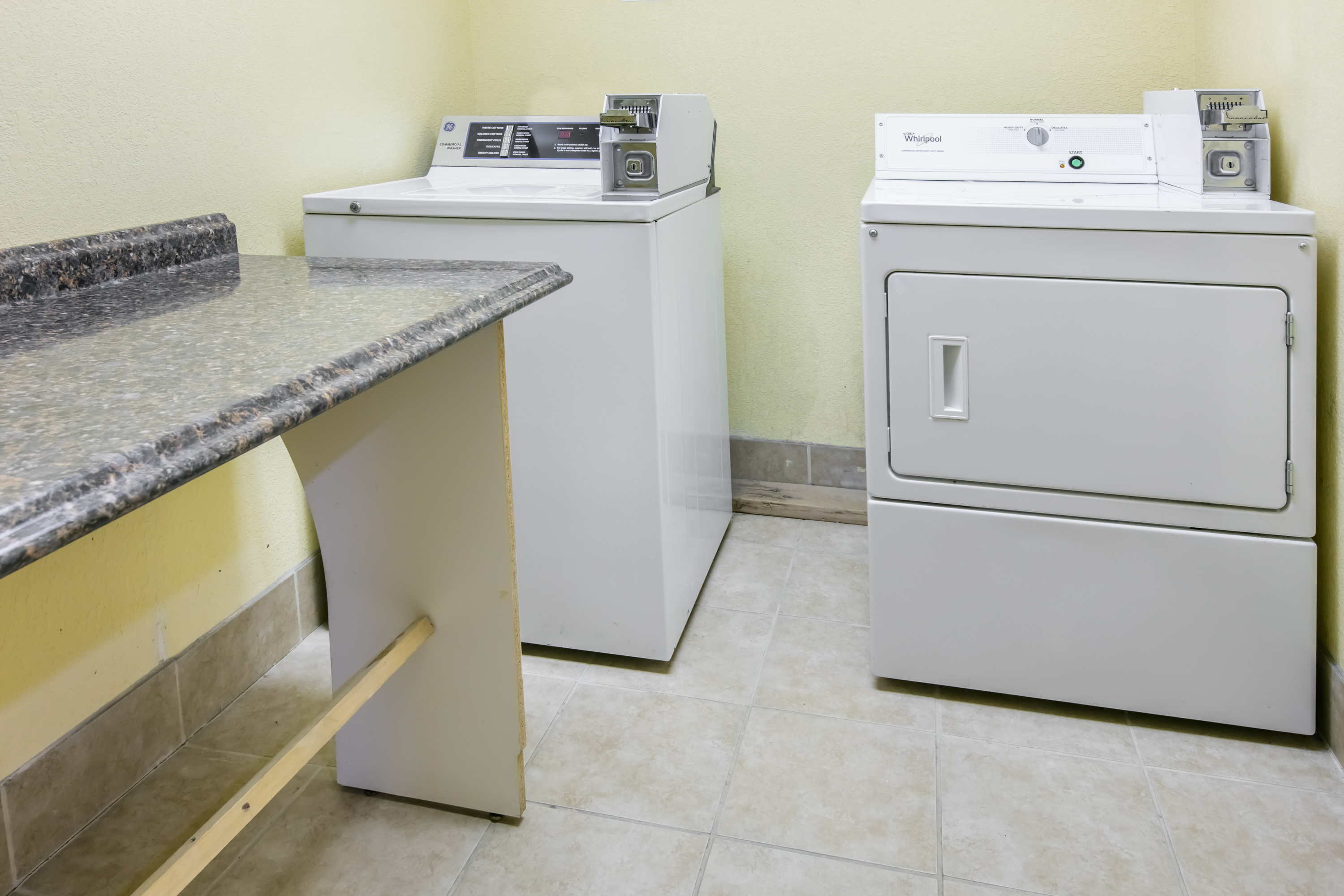 Laundry facilities at Days Inn & Suites by Wyndham Pryor in Pryor, Oklahoma