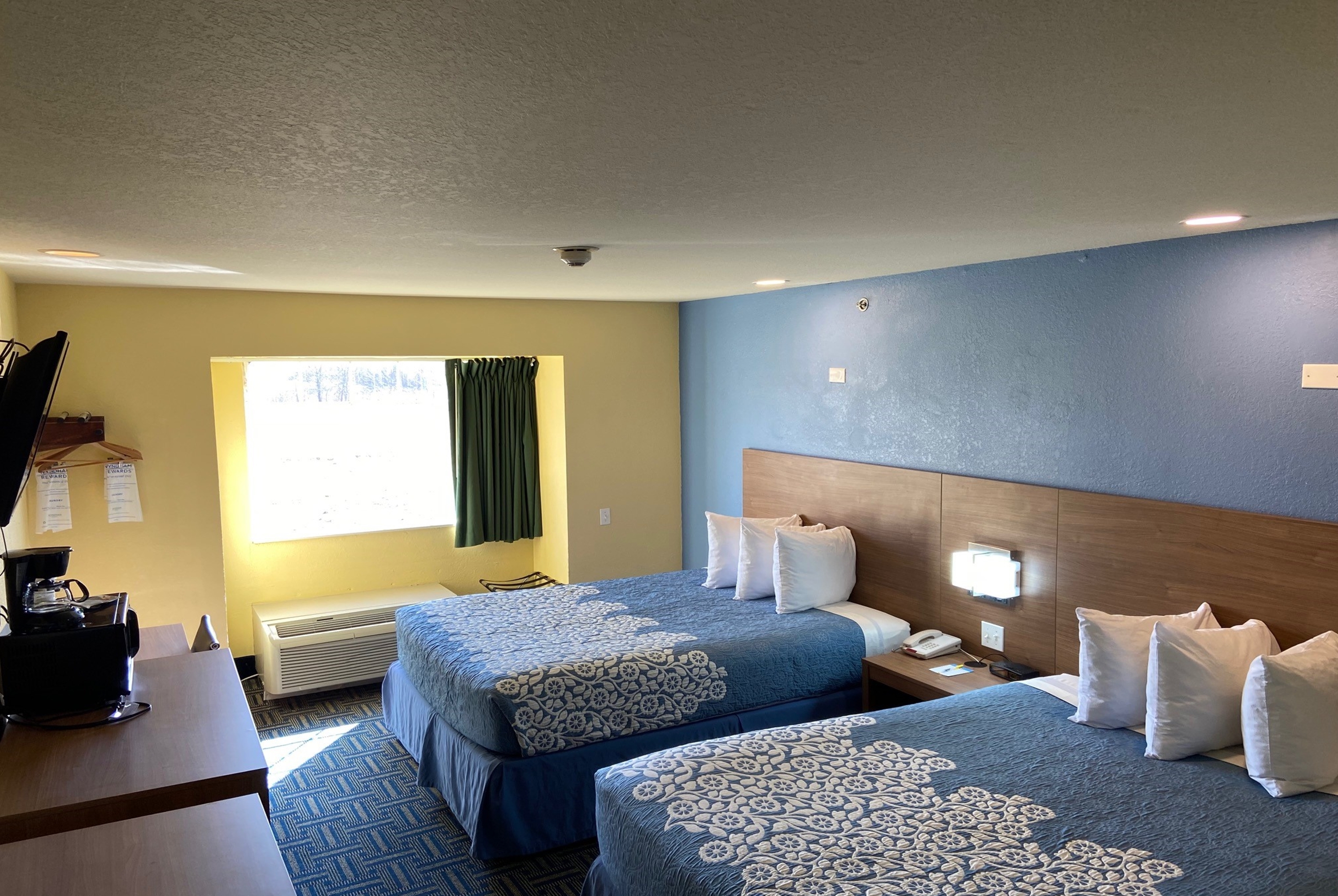 Guest room at the Days Inn & Suites by Wyndham Pryor in Pryor, Oklahoma