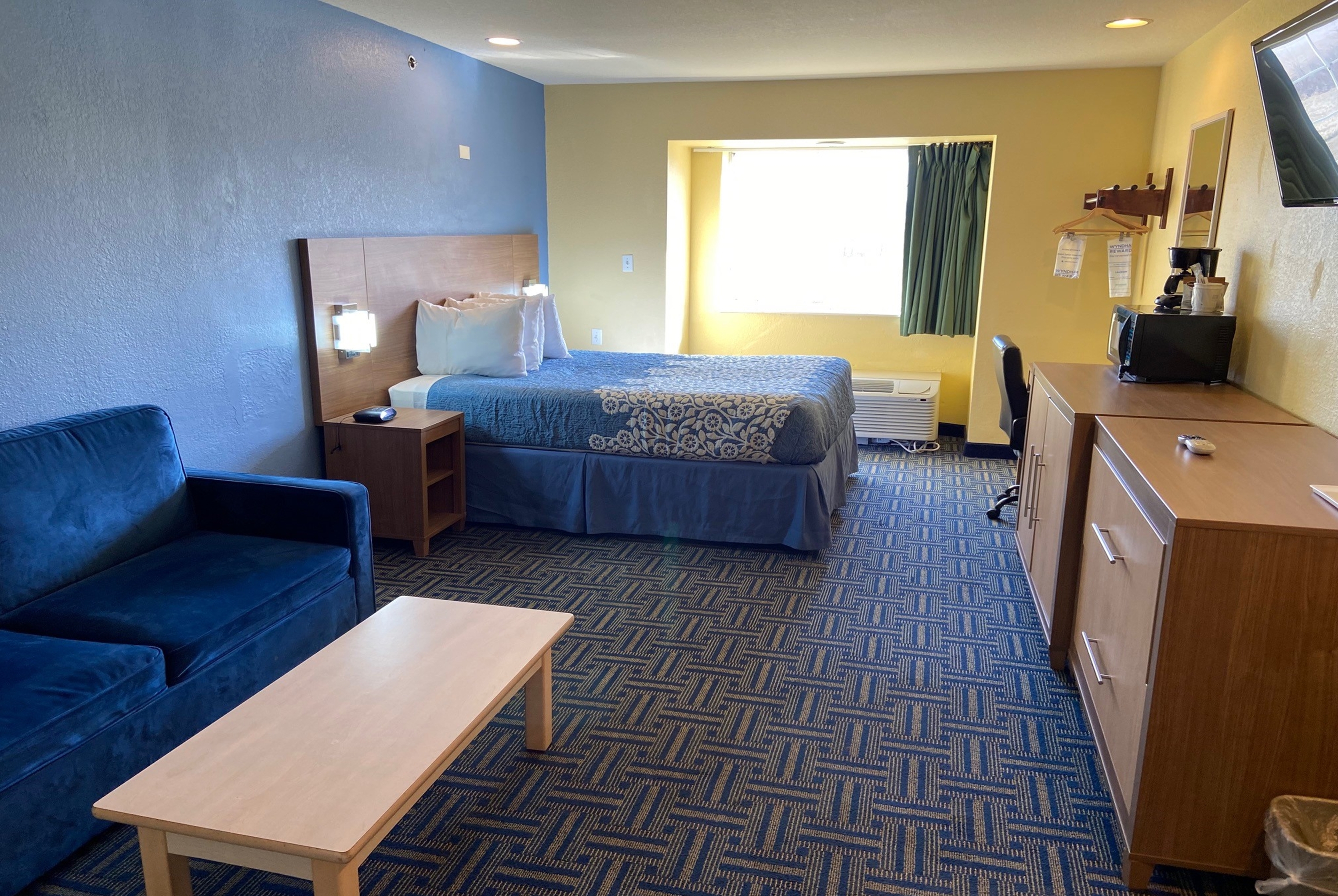 Guest room at the Days Inn & Suites by Wyndham Pryor in Pryor, Oklahoma