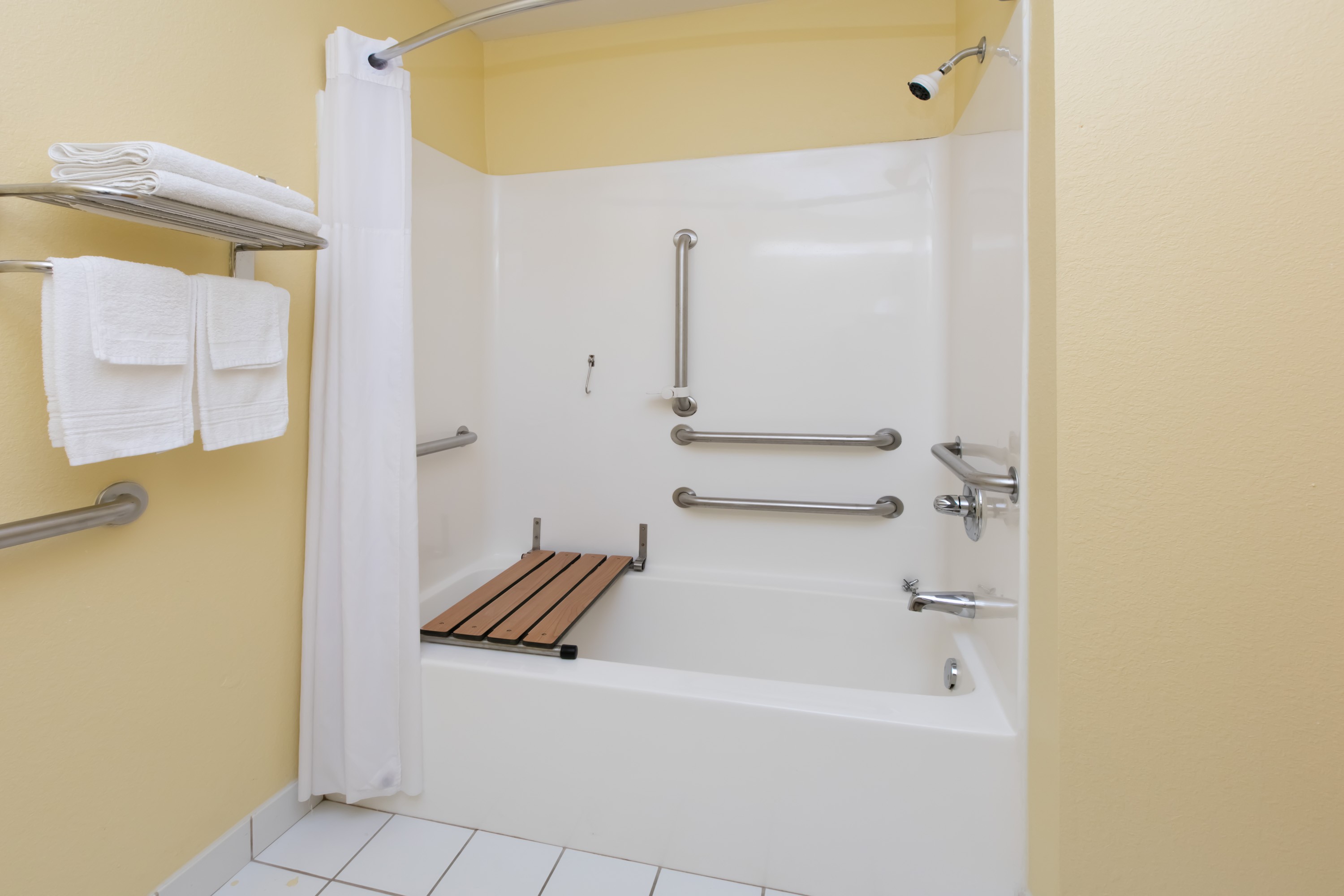 Guest room at the Days Inn & Suites by Wyndham Pryor in Pryor, Oklahoma