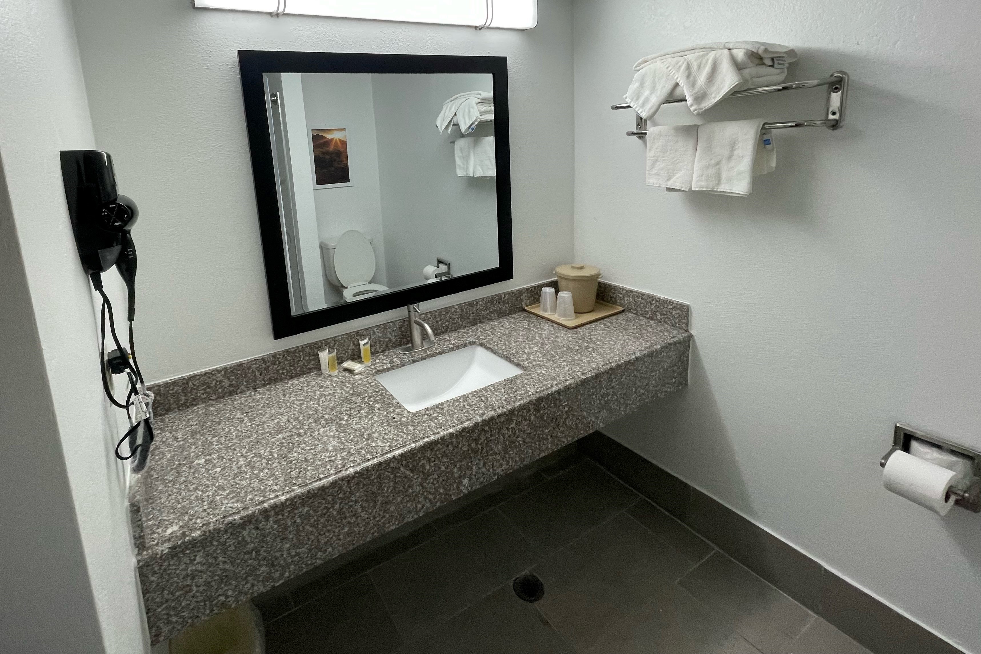 Guest room at the Days Inn by Wyndham Shawnee in Shawnee, Oklahoma