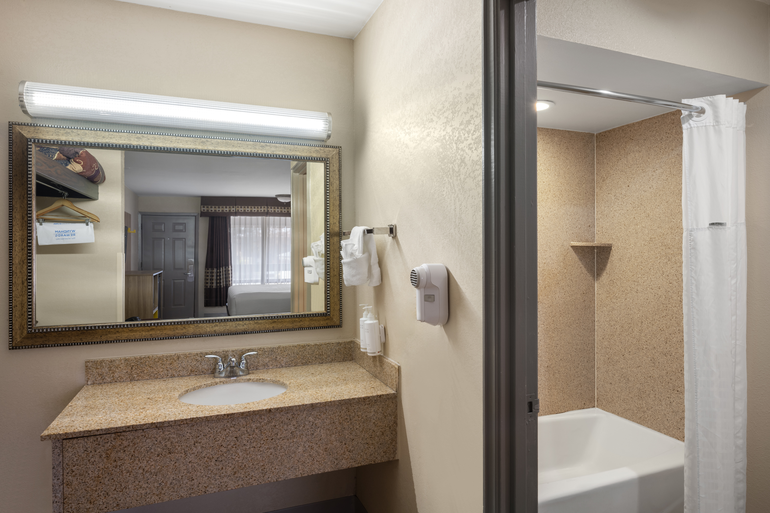Guest room bath at the Days Inn by Wyndham Klamath Falls in Klamath Falls, Oregon