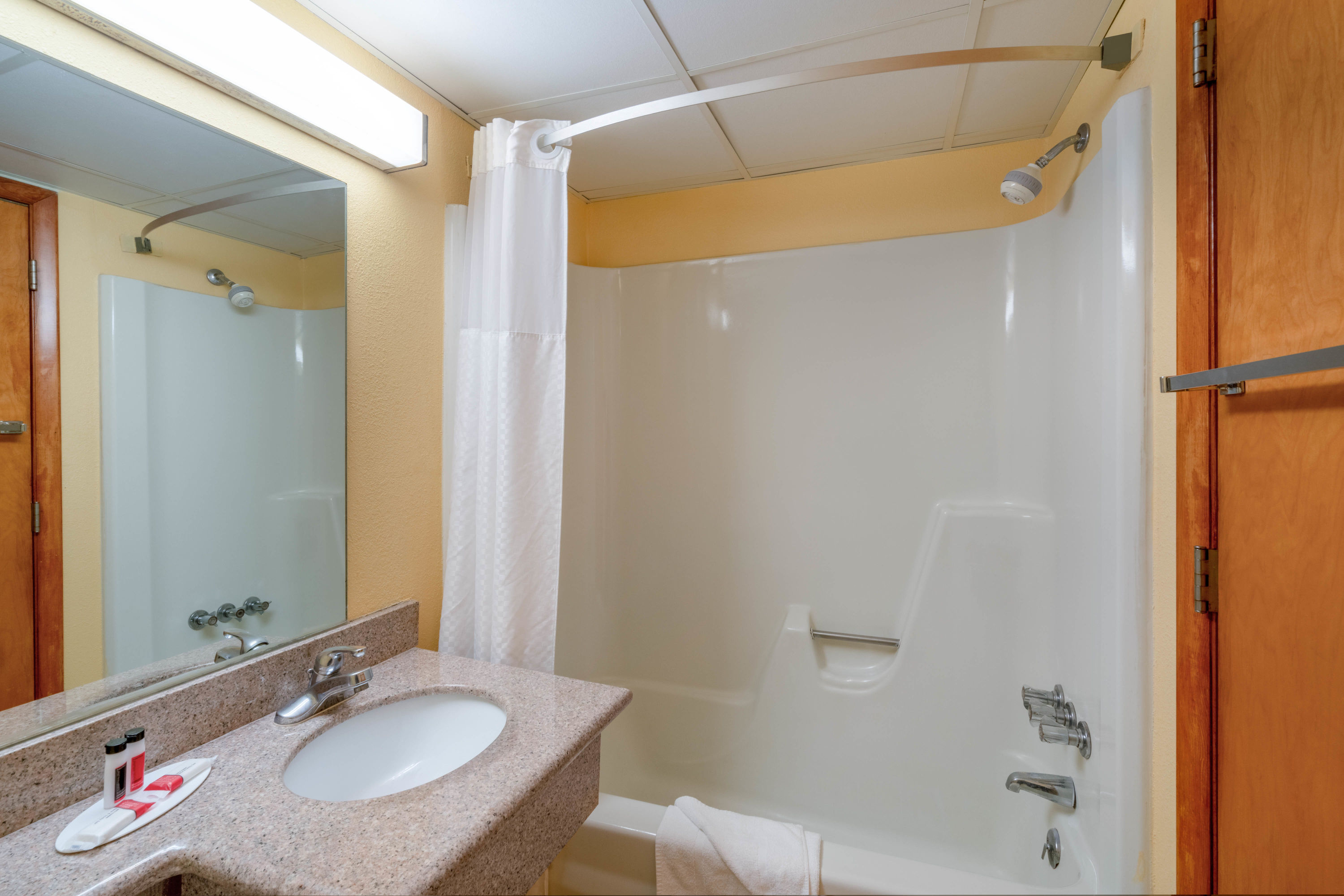 Guest room bath at the Days Inn by Wyndham Scranton PA in Scranton, Pennsylvania