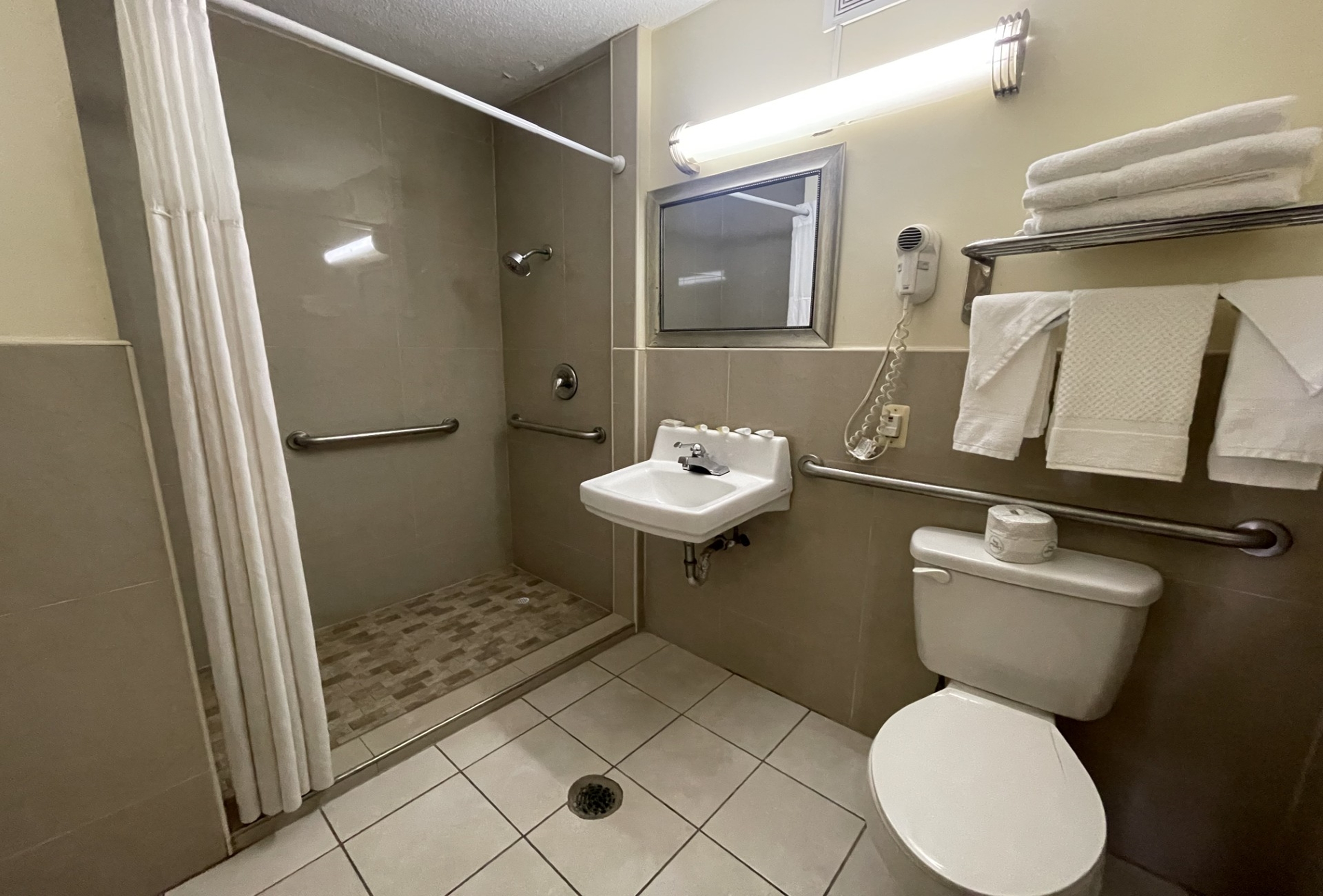 Guest room bath at the Days Inn & Suites by Wyndham York in York, Pennsylvania