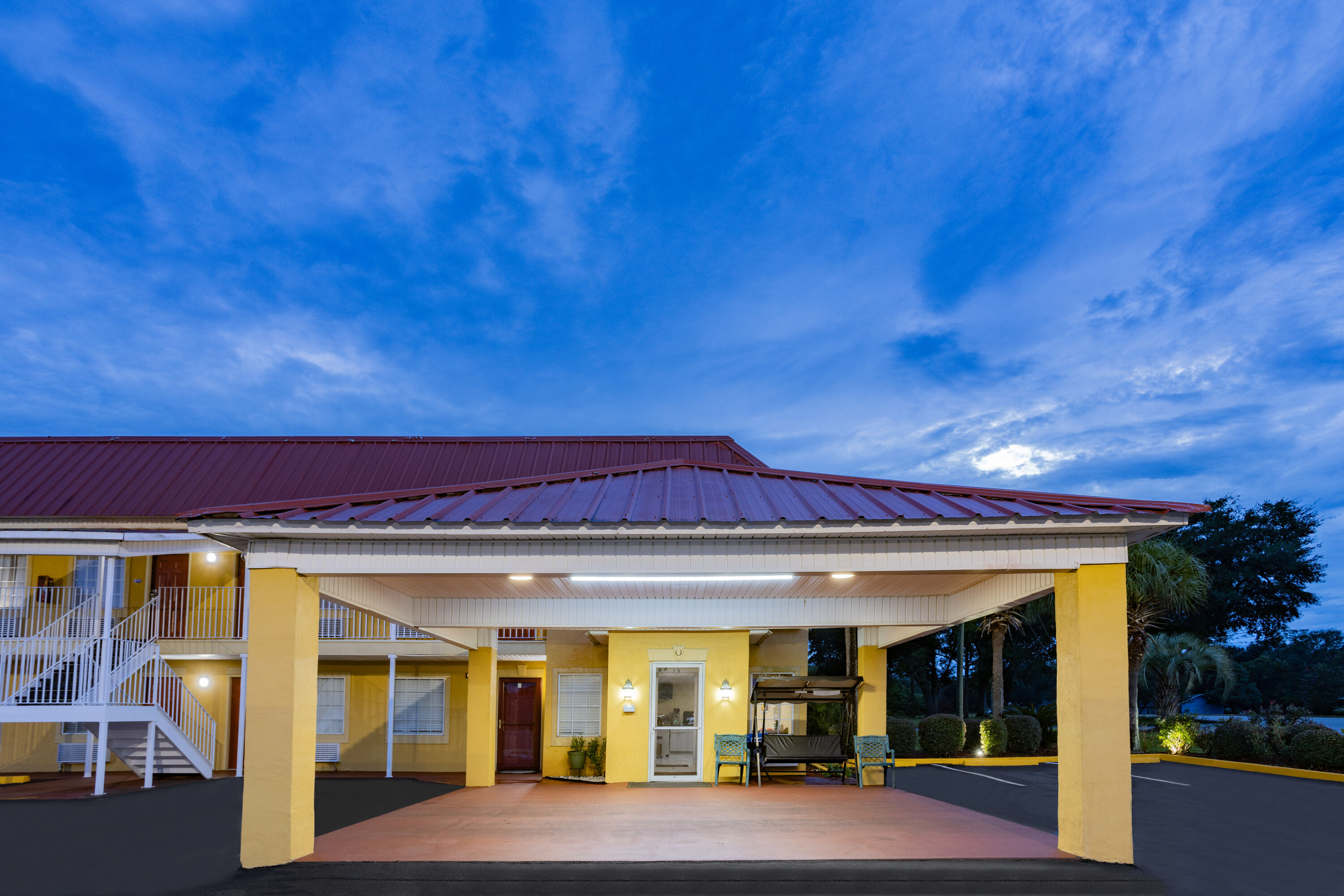 Exterior Dusk Image of Days Inn by Wyndham Barnwell hotel in Barnwell, South Carolina