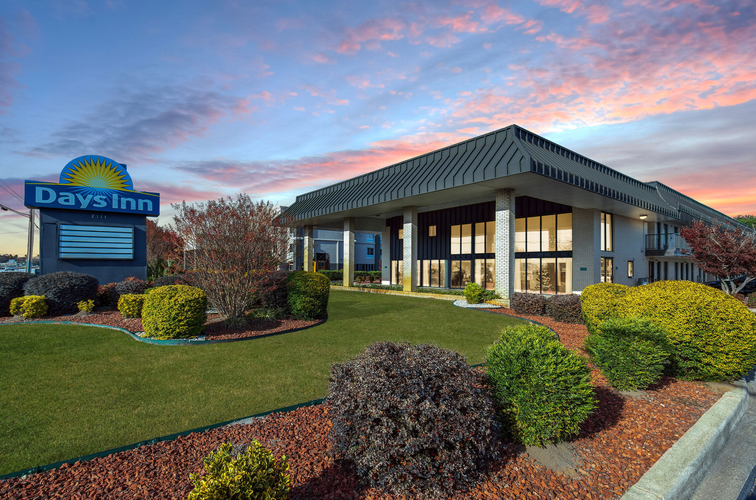Exterior Dusk Image of Days Inn by Wyndham Florence/I-95 North hotel in Florence, South Carolina