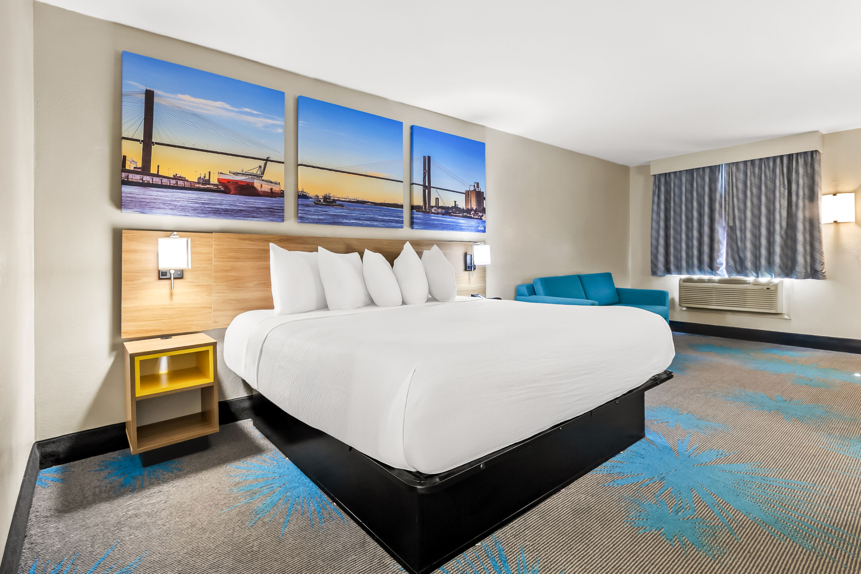 King bed guest room at the Days Inn by Wyndham Goose Creek in Goose Creek, South Carolina