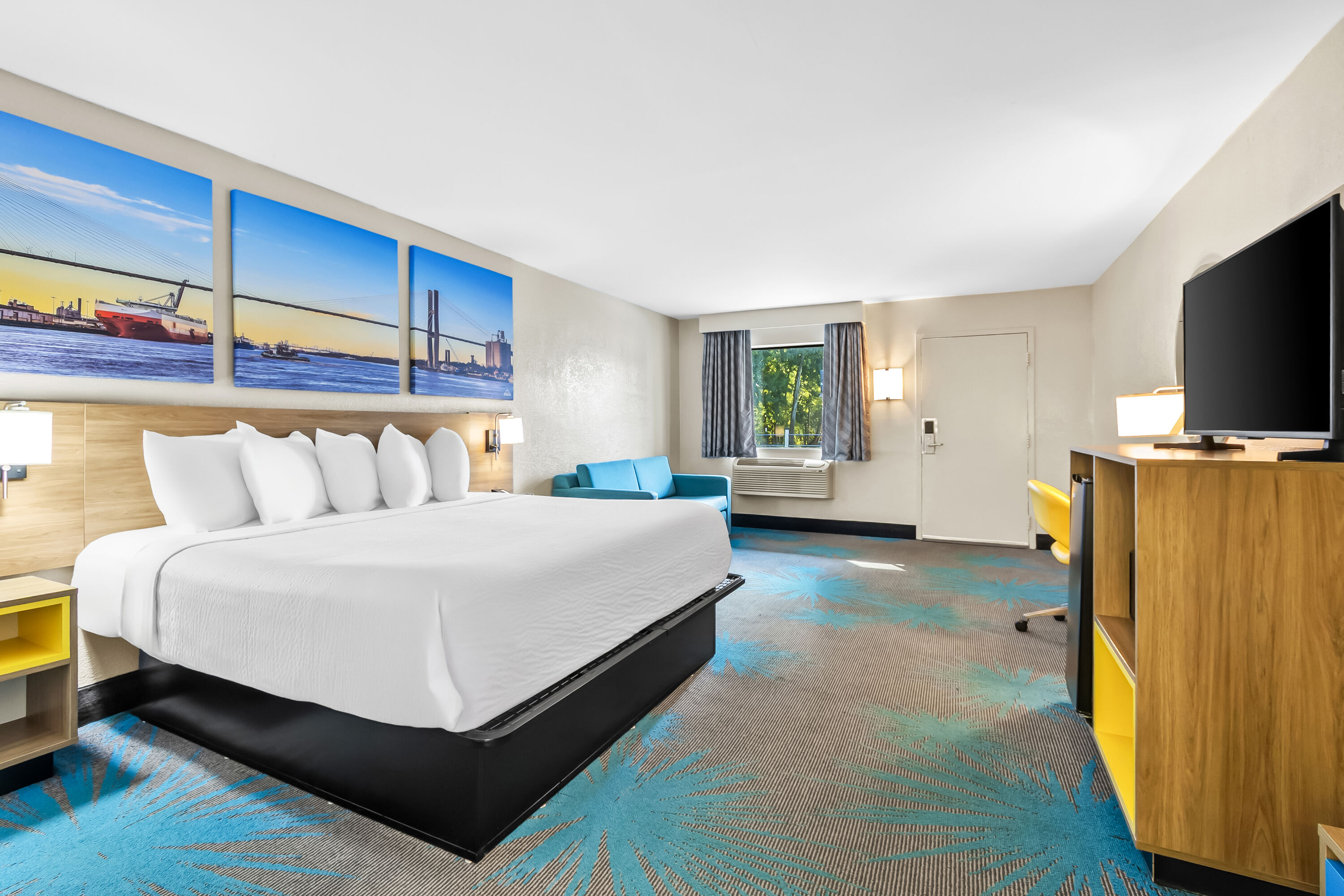 King bed guest room at the Days Inn by Wyndham Goose Creek in Goose Creek, South Carolina