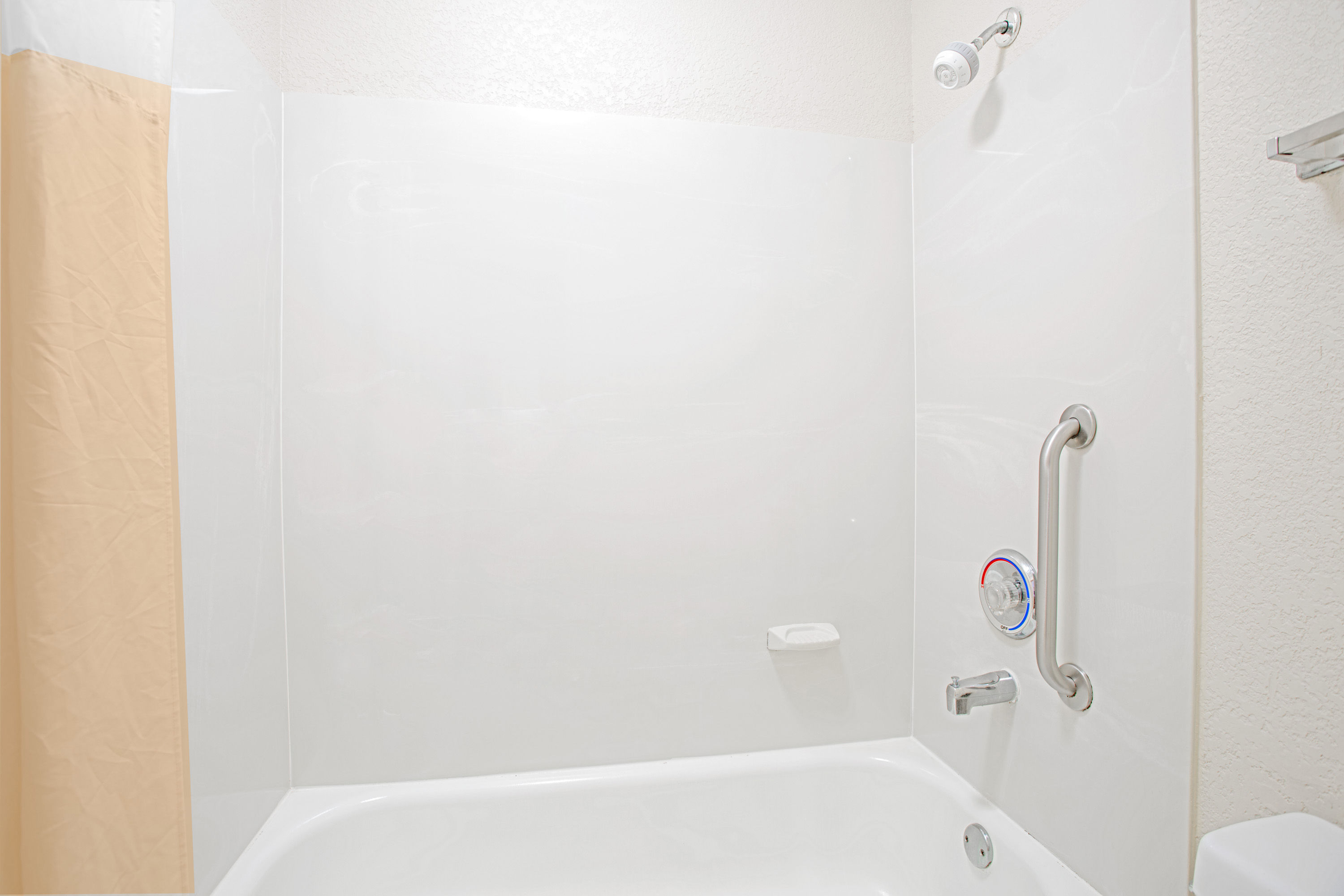 Guest room bath at the Days Inn by Wyndham Greenville in Greenville, South Carolina