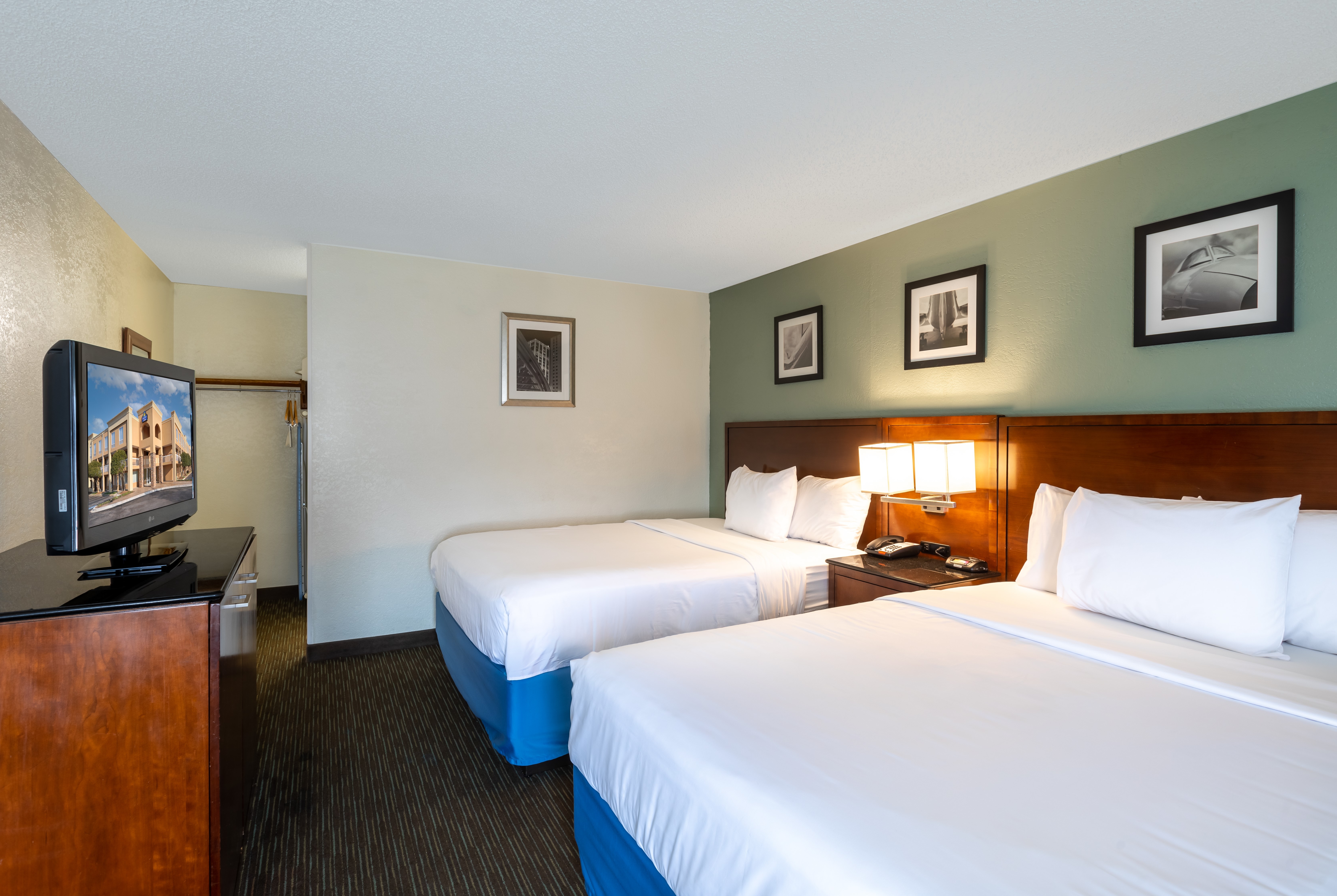 Guest room at the Days Inn by Wyndham Greenville in Greenville, South Carolina