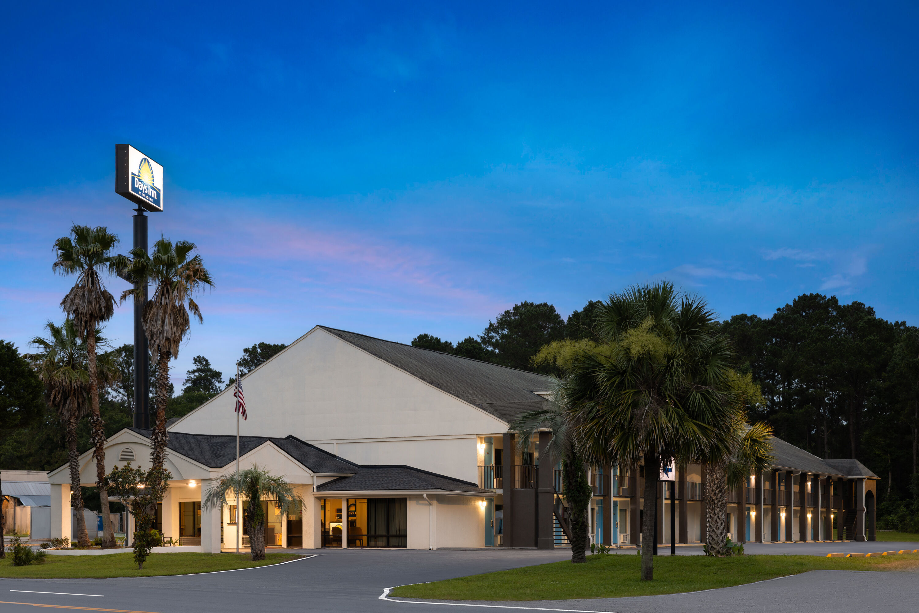 Exterior Dusk Image of Days Inn by Wyndham Hardeeville Near Hilton Head hotel in Hardeeville, South Carolina