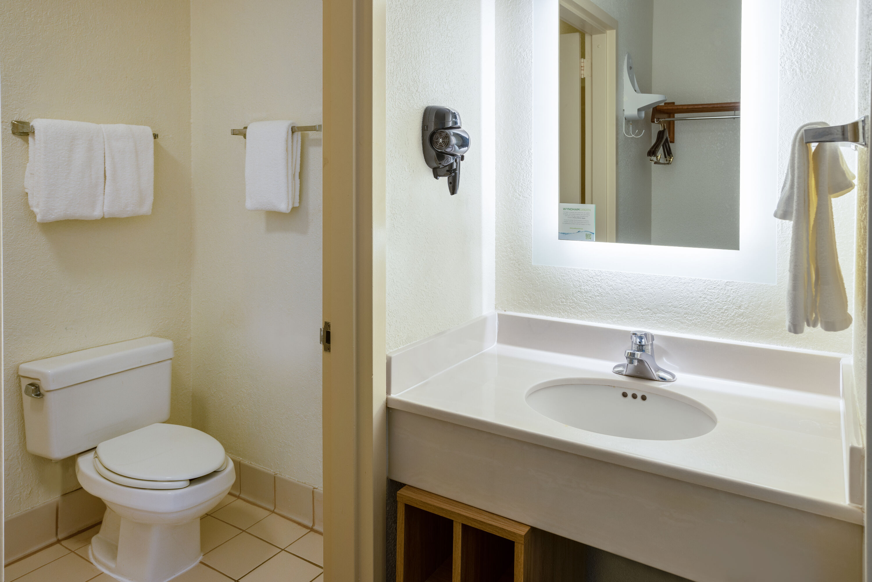 Guest room bath at the Hotel Carolina A Days Inn by Wyndham in Hilton Head, South Carolina