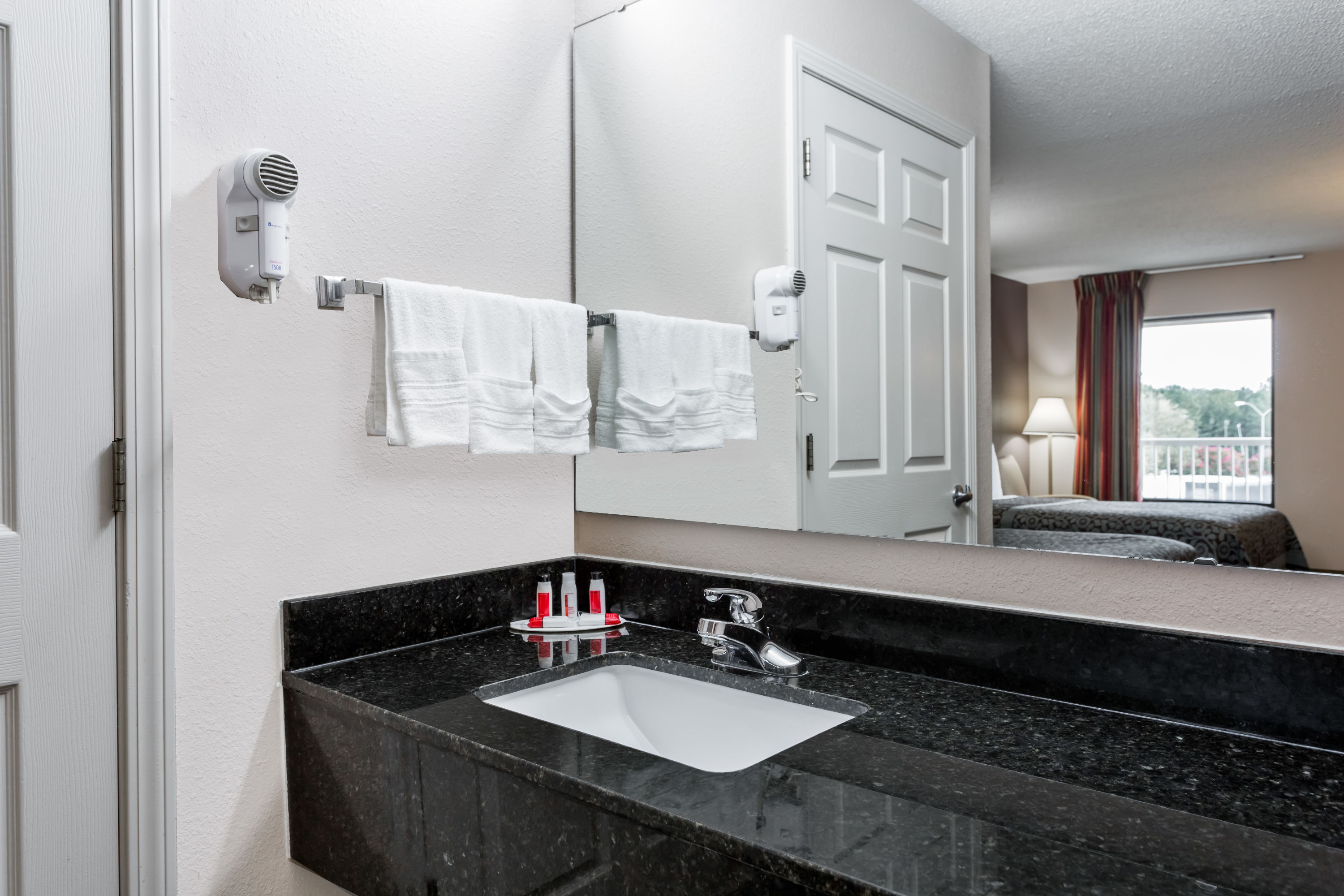 Guest room bath at the Days Inn by Wyndham Lugoff in Lugoff, South Carolina