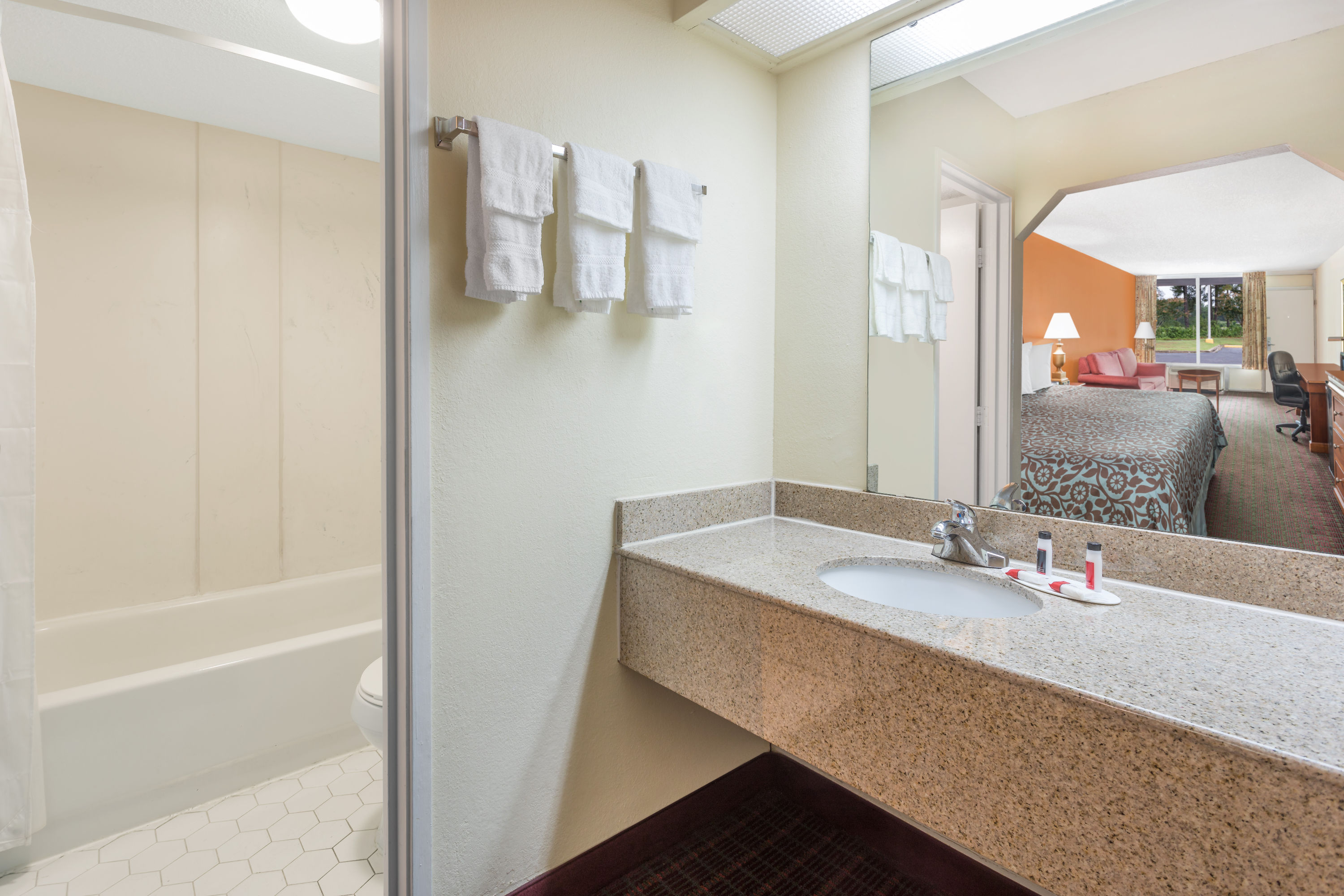 Guest room bath at the Days Inn by Wyndham Orangeburg South in Orangeburg, South Carolina