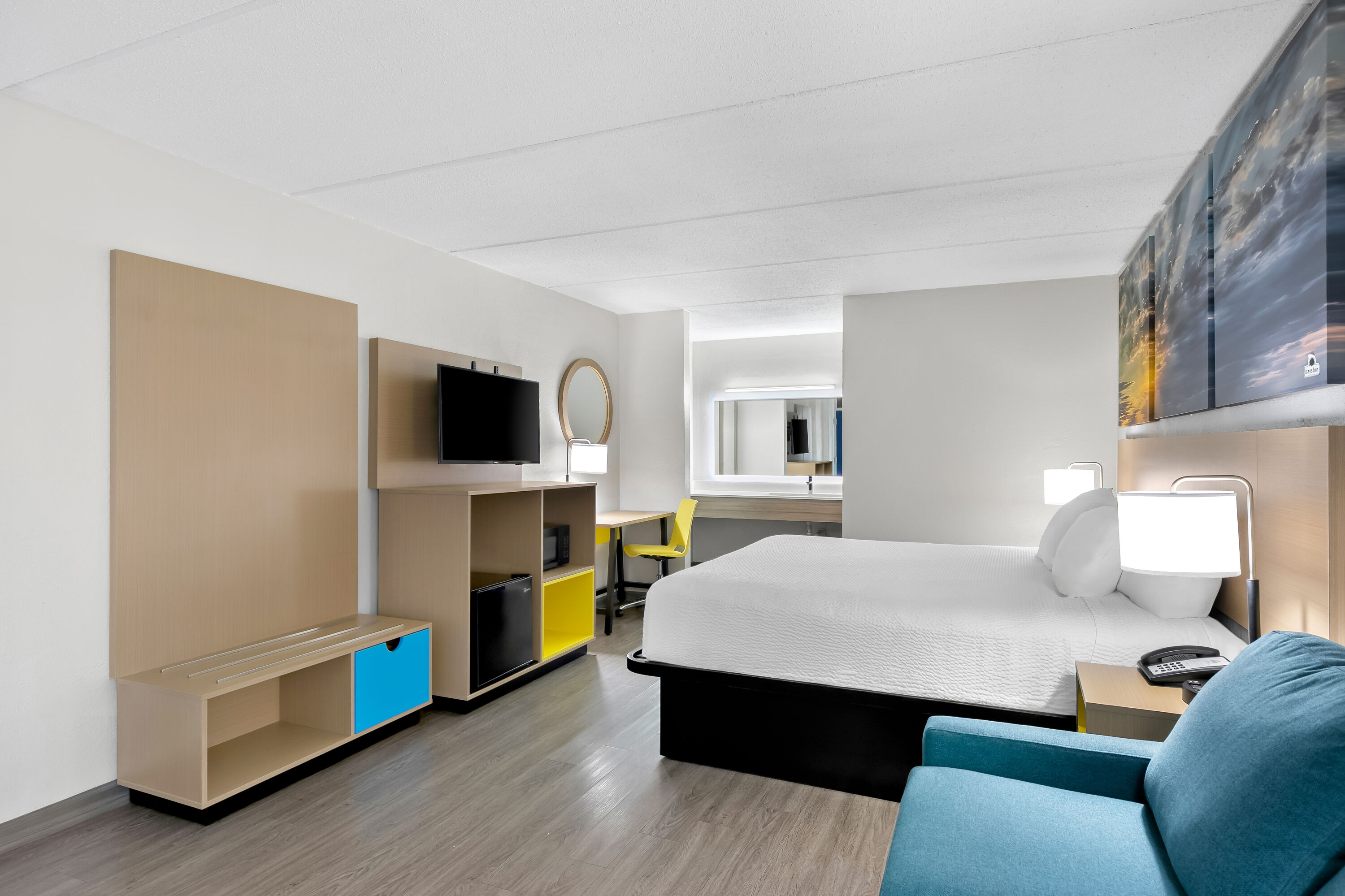 King bed guest room at the Days Inn by Wyndham Seneca / Clemson Area in Seneca, South Carolina