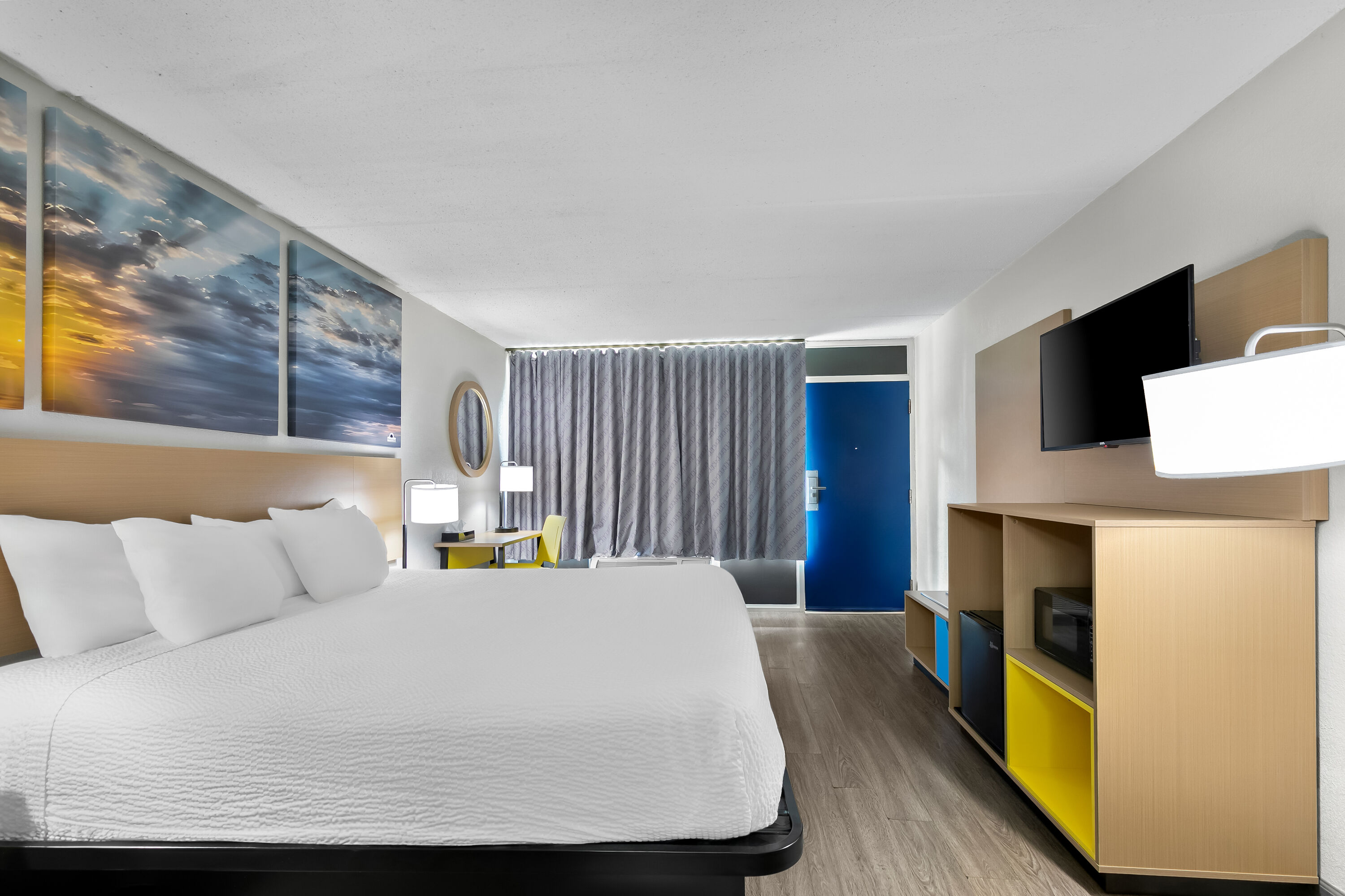 King bed guest room at the Days Inn by Wyndham Seneca / Clemson Area in Seneca, South Carolina