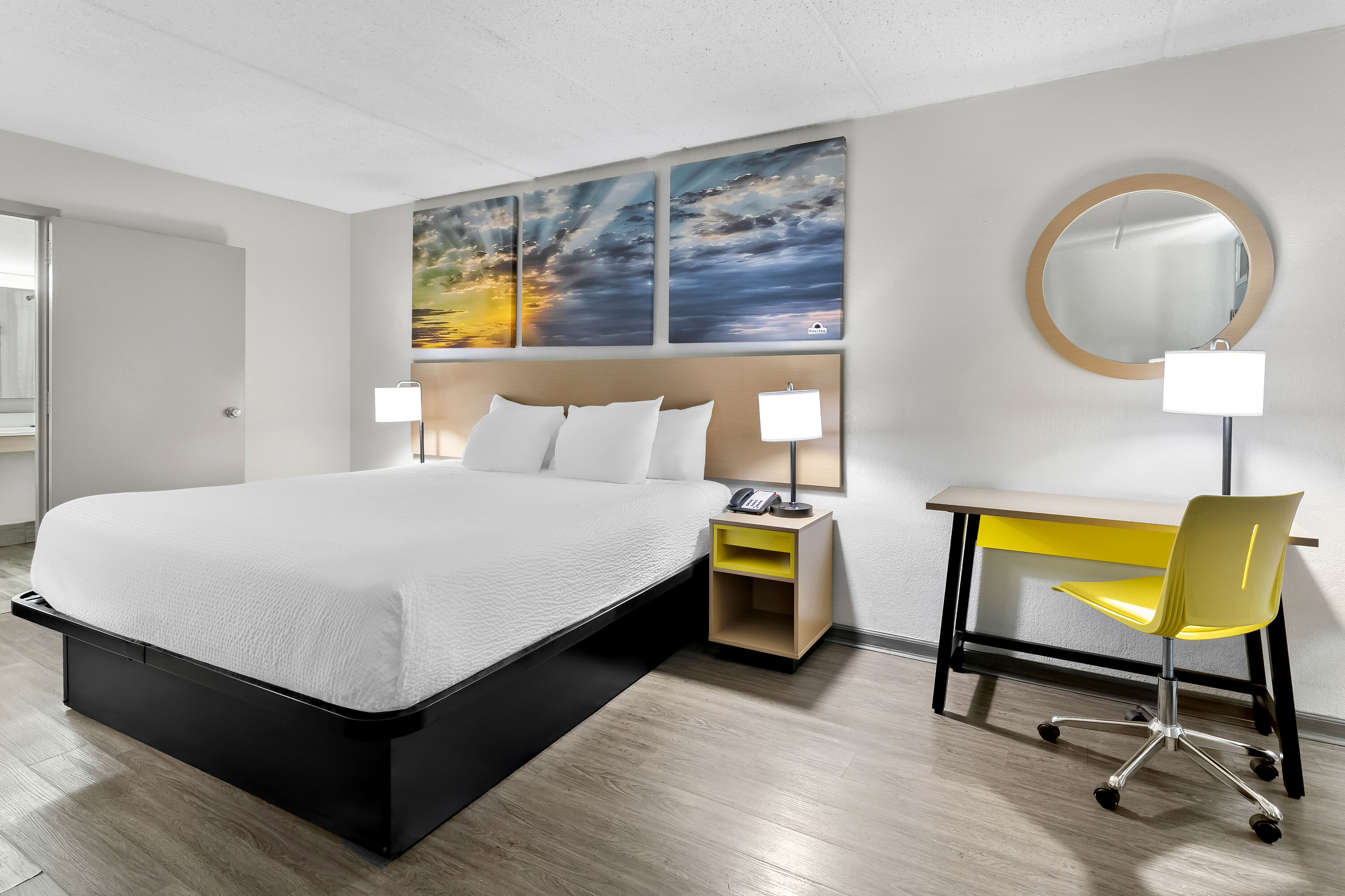 King bed guest room at the Days Inn by Wyndham Seneca / Clemson Area in Seneca, South Carolina