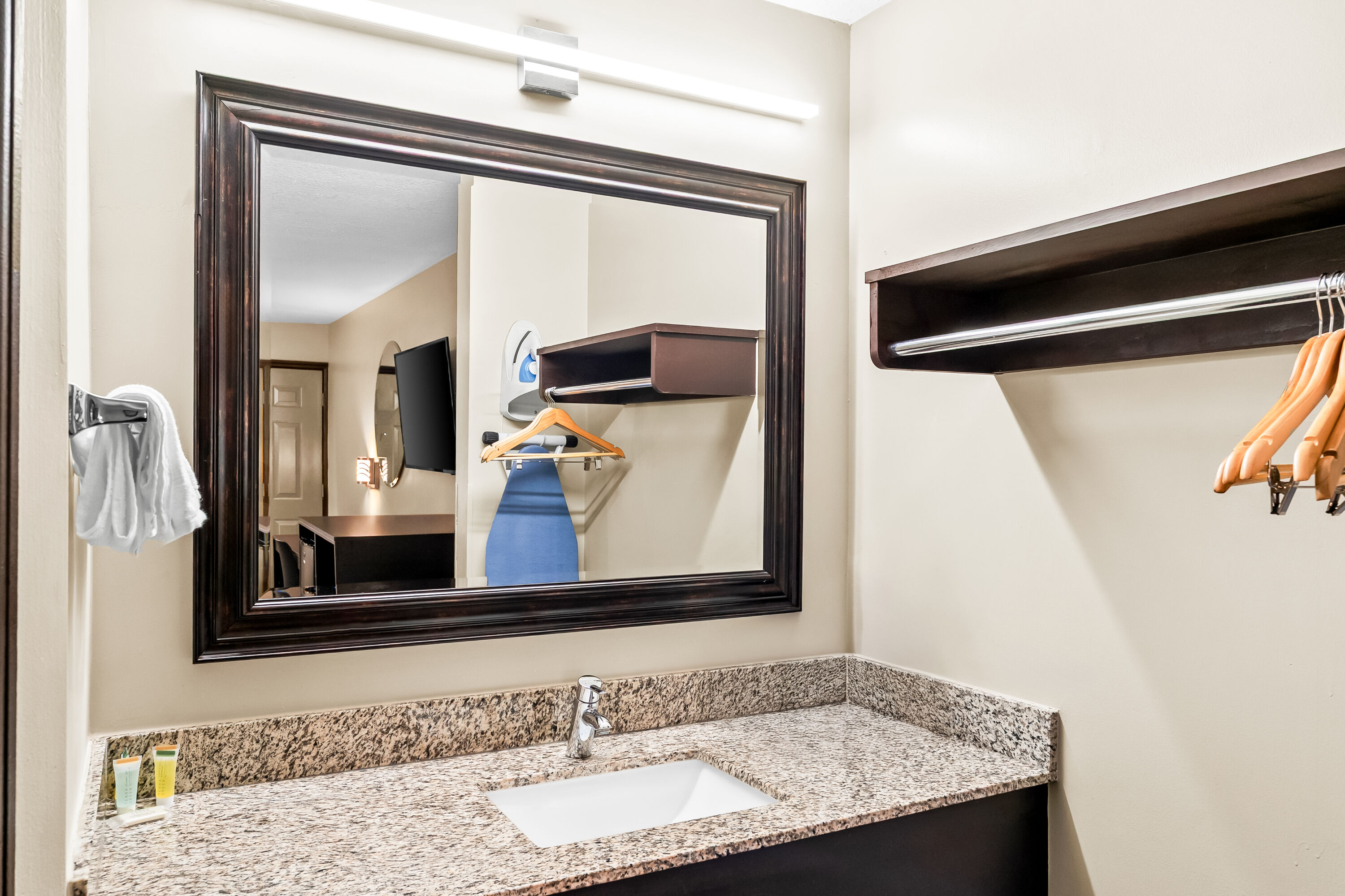 Guest room bath at the Days Inn by Wyndham Spartanburg in Spartanburg, South Carolina