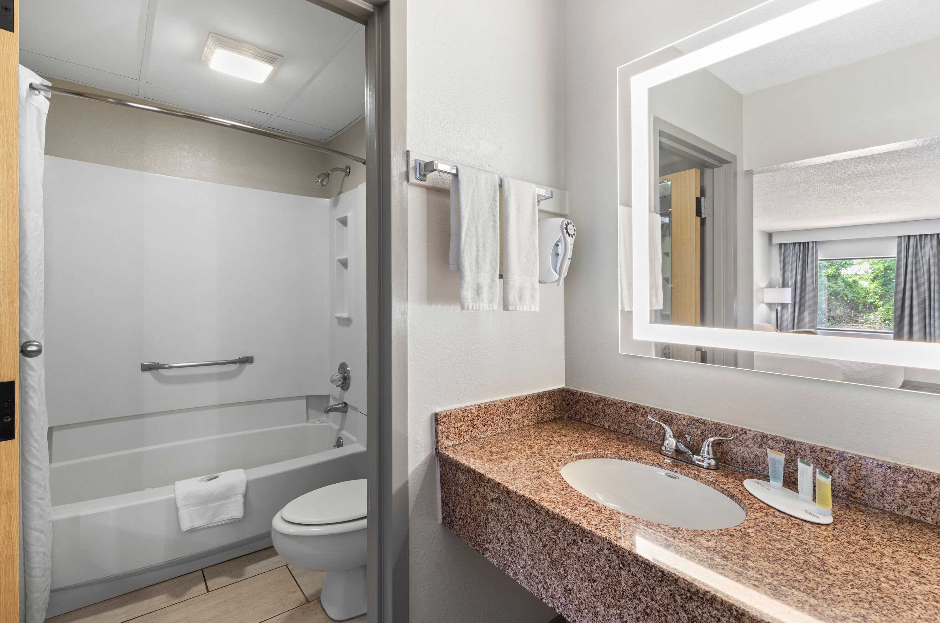 Guest room bath at the Days Inn by Wyndham St George in St George, South Carolina