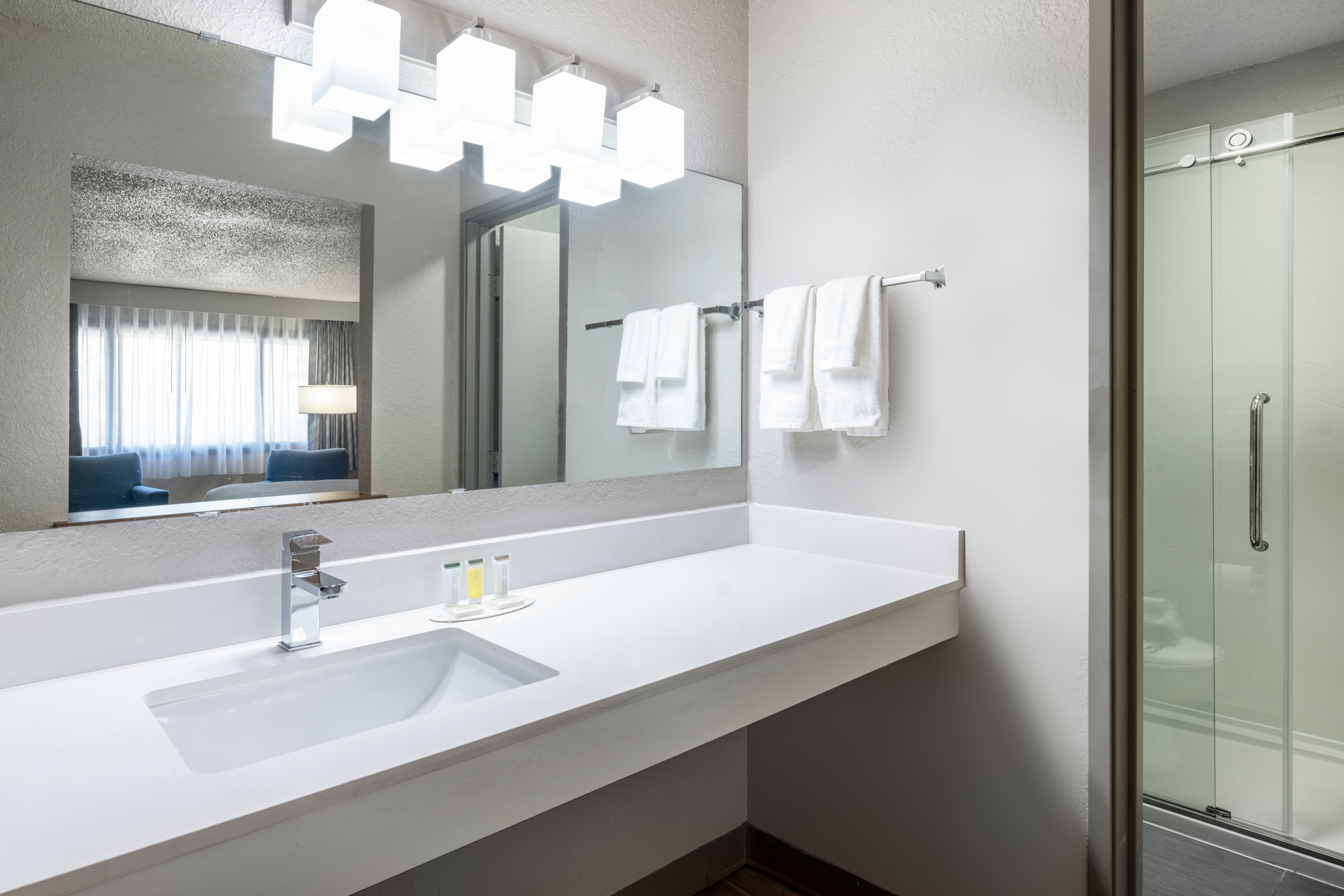 Guest room bath at the Days Inn by Wyndham Sioux Falls Airport in Sioux Falls, South Dakota