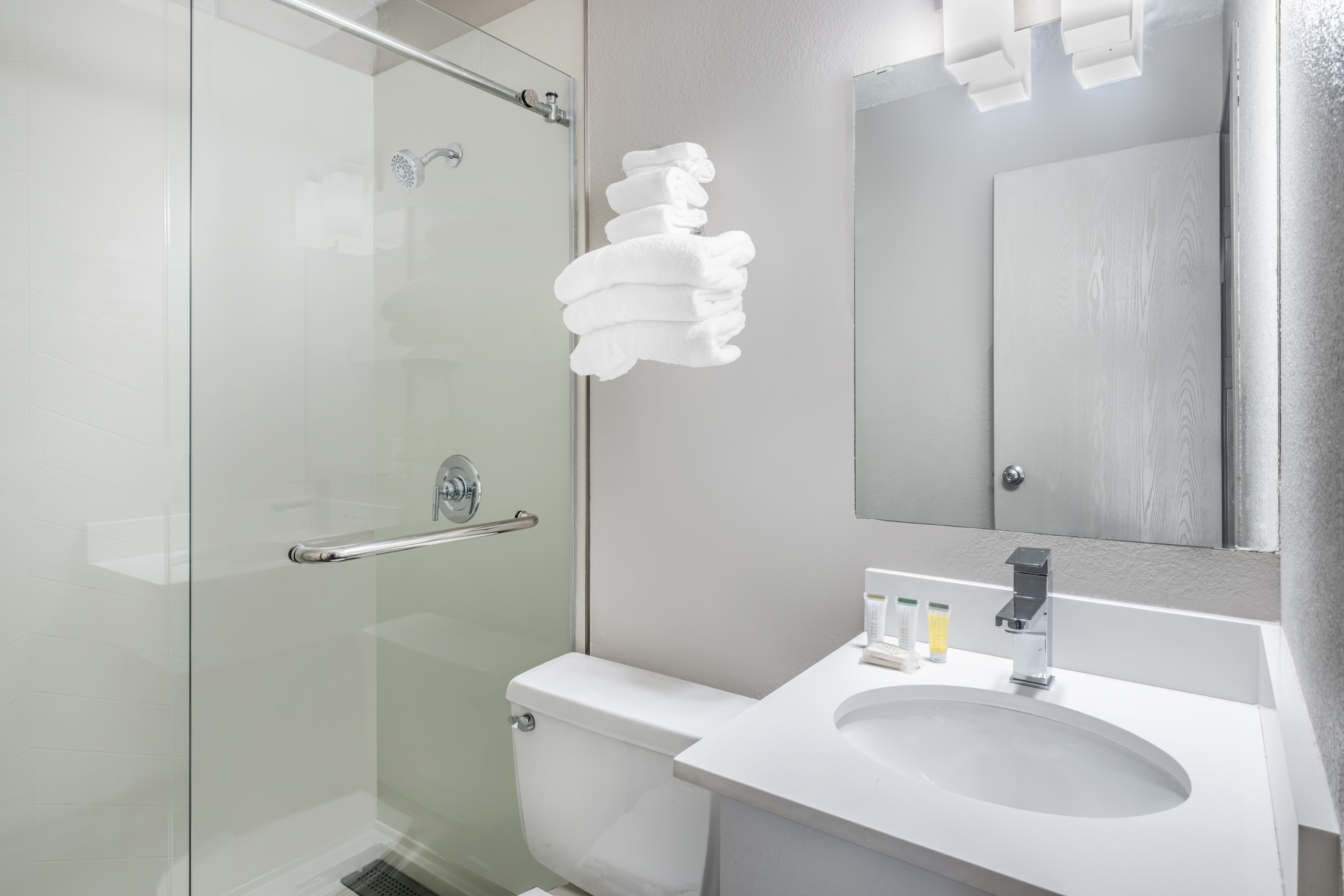 Guest room bath at the Days Inn by Wyndham Sioux Falls Airport in Sioux Falls, South Dakota