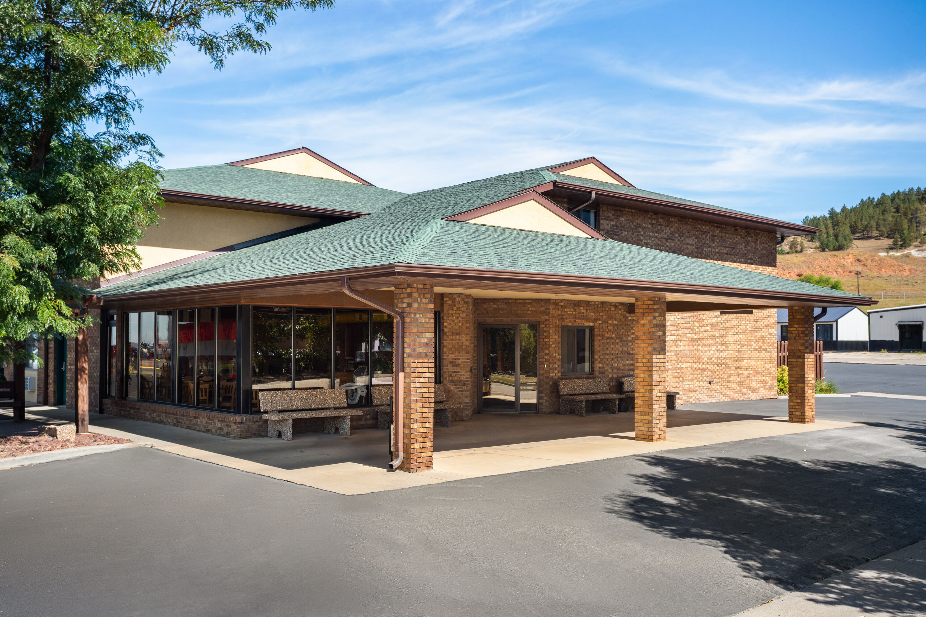 Exterior Day Image of Days Inn by Wyndham Spearfish hotel in Spearfish, South Dakota