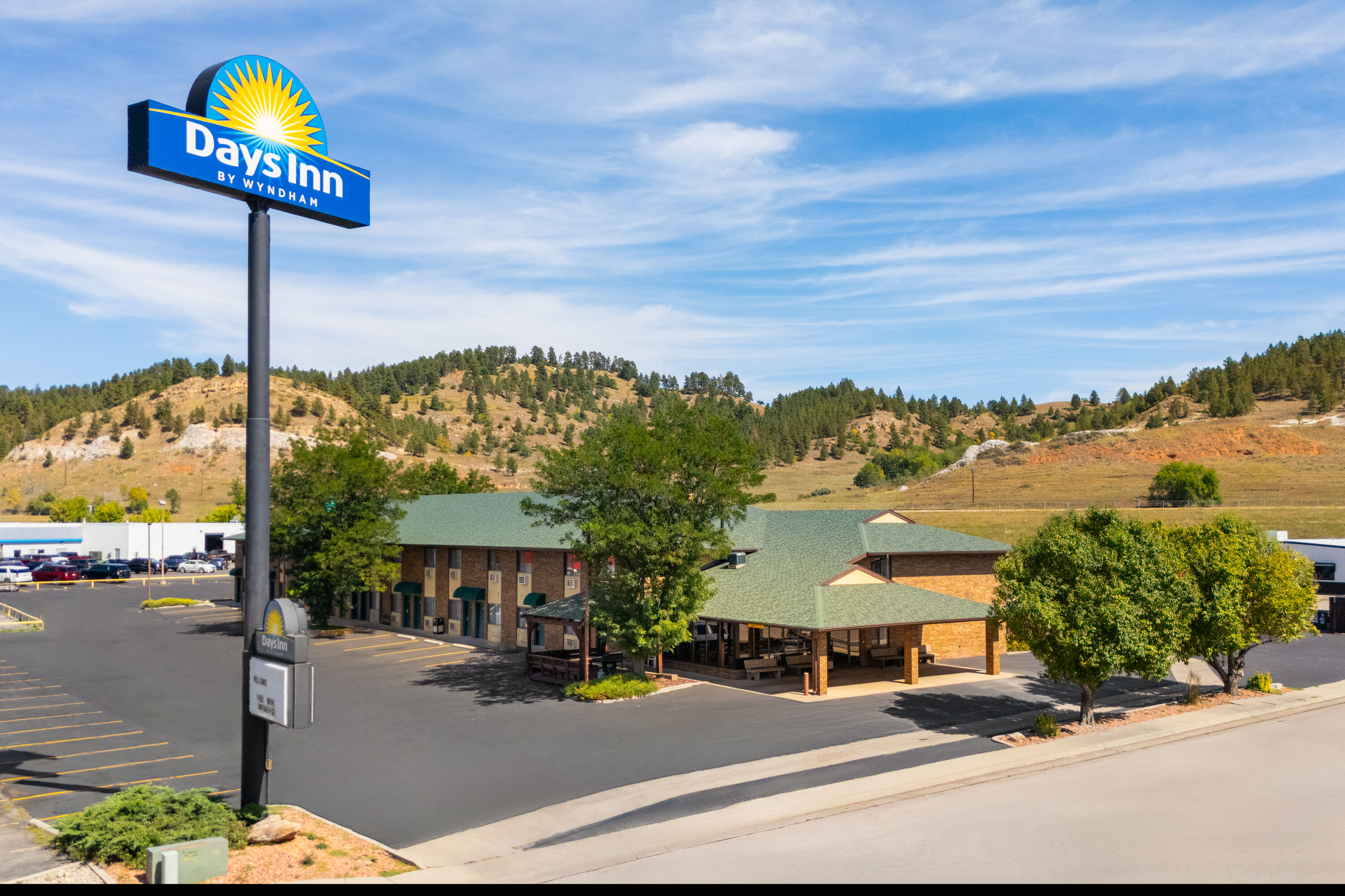 Exterior Day Image of Days Inn by Wyndham Spearfish hotel in Spearfish, South Dakota