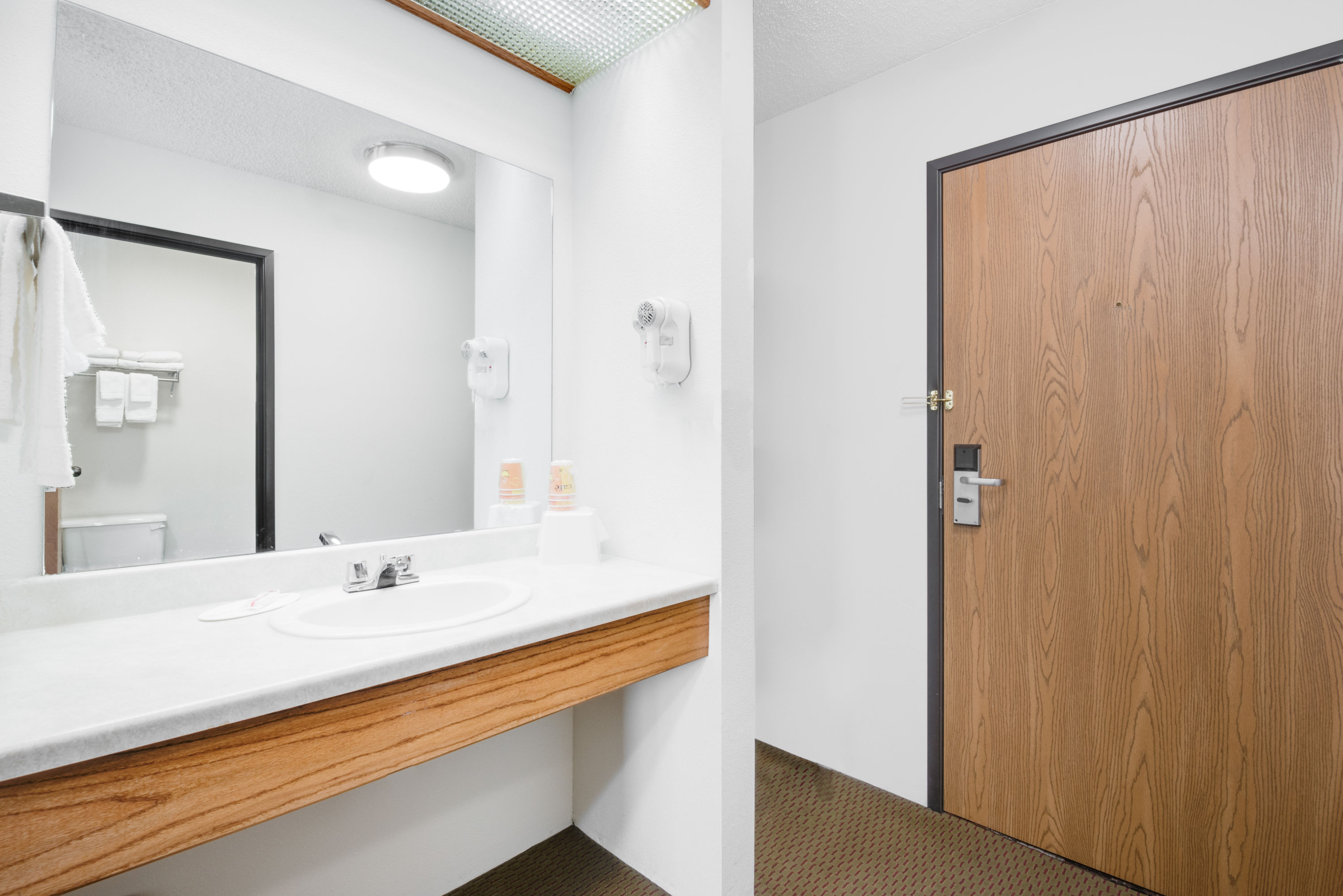 Guest room bath at the Days Inn by Wyndham Sturgis in Sturgis, South Dakota