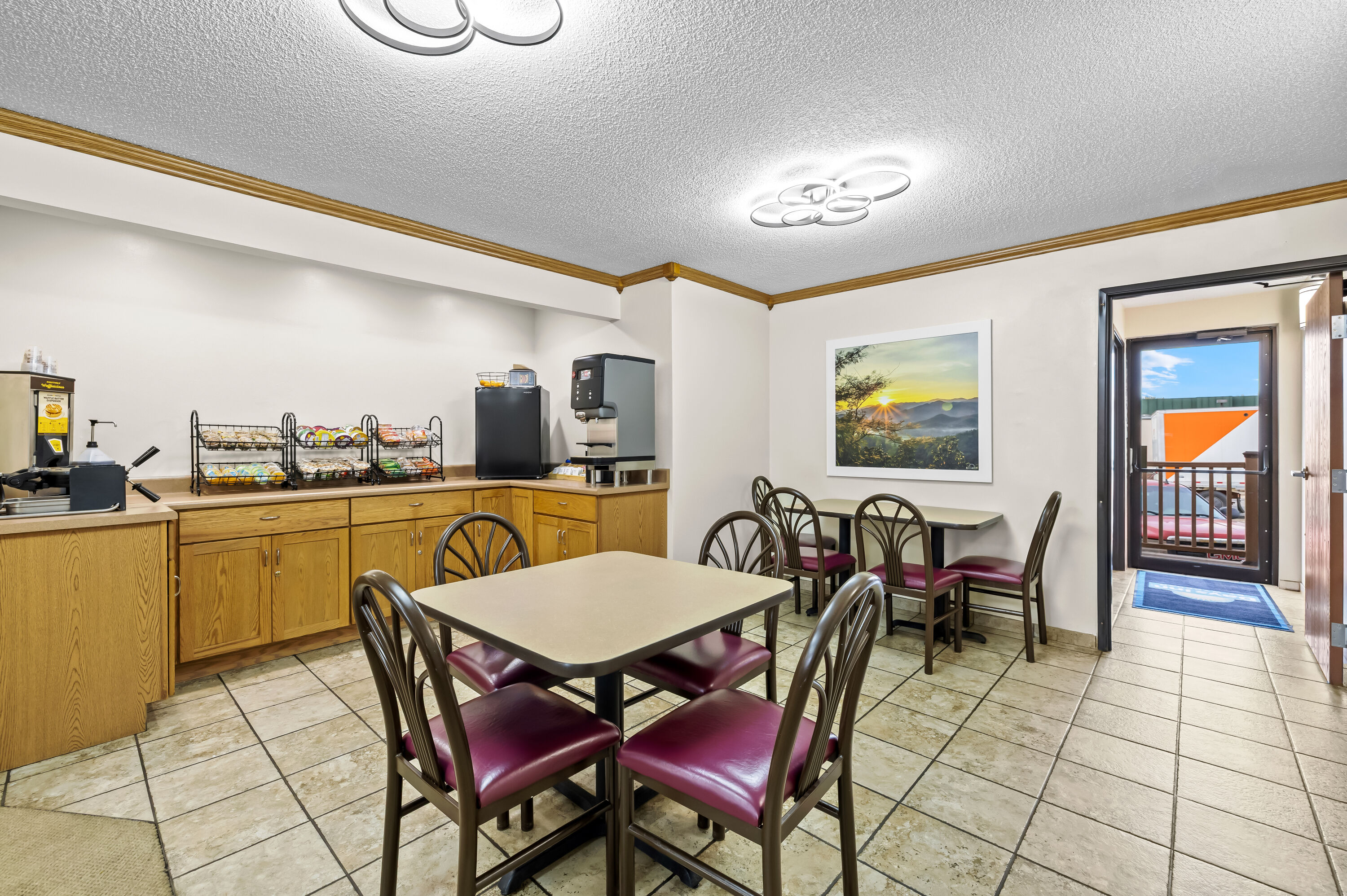 Days Inn by Wyndham Wall restaurant breakfast area with seating in Wall, South Dakota